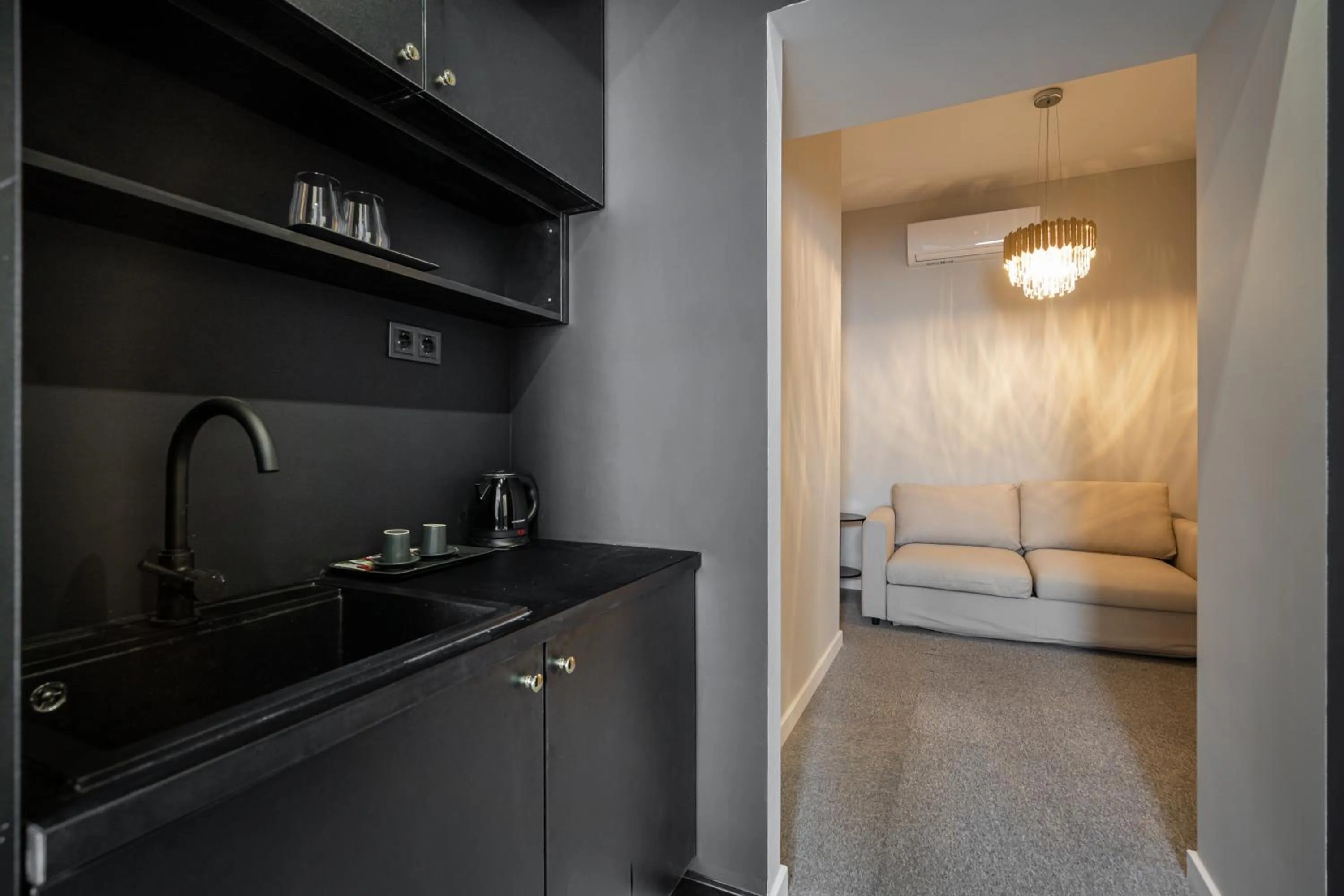 Kitchen or kitchenette in Astoria Boutique Suites- Best Location by BQA