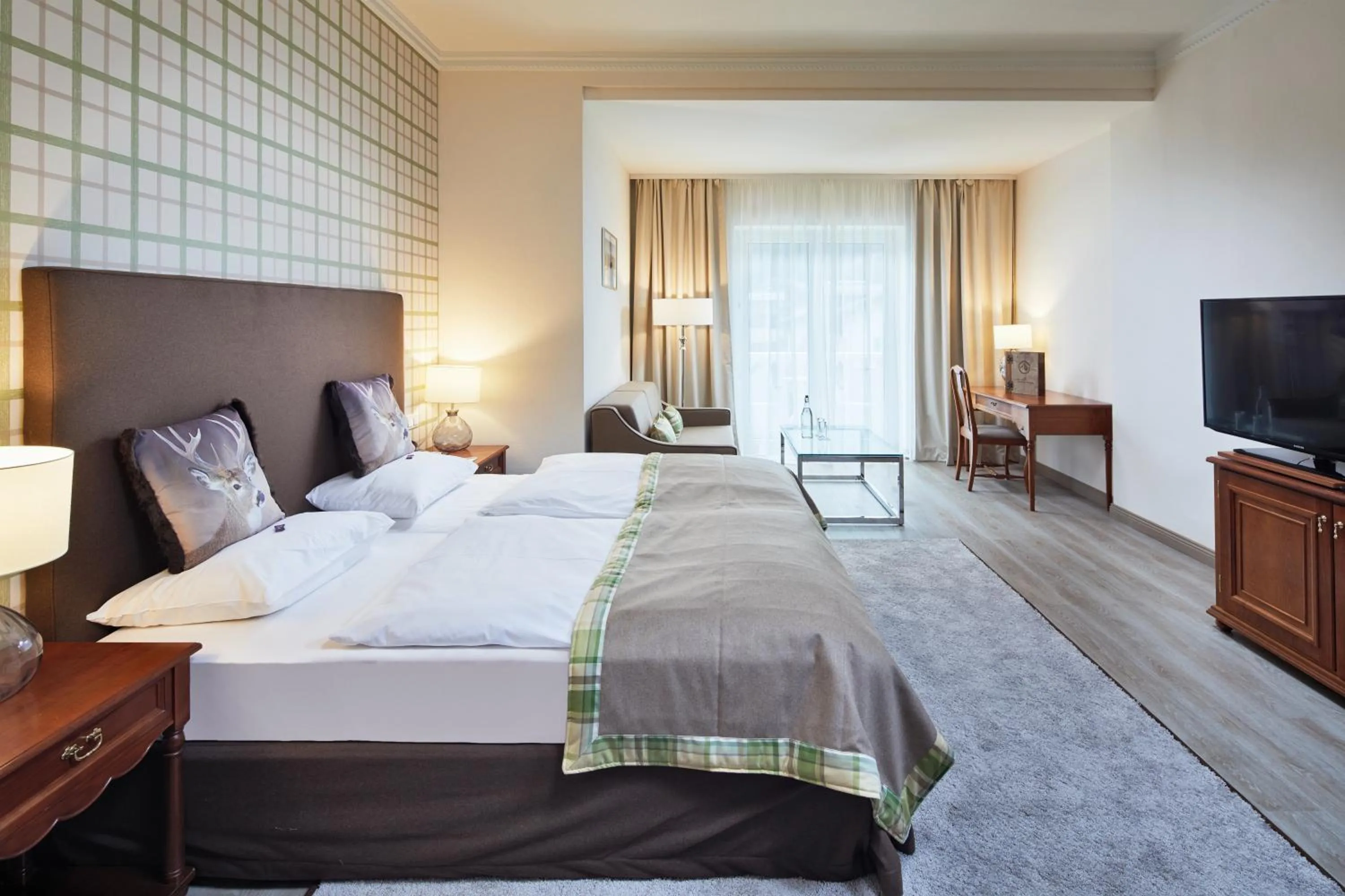 Photo of the whole room, Bed in Das Alpenhaus Gasteinertal