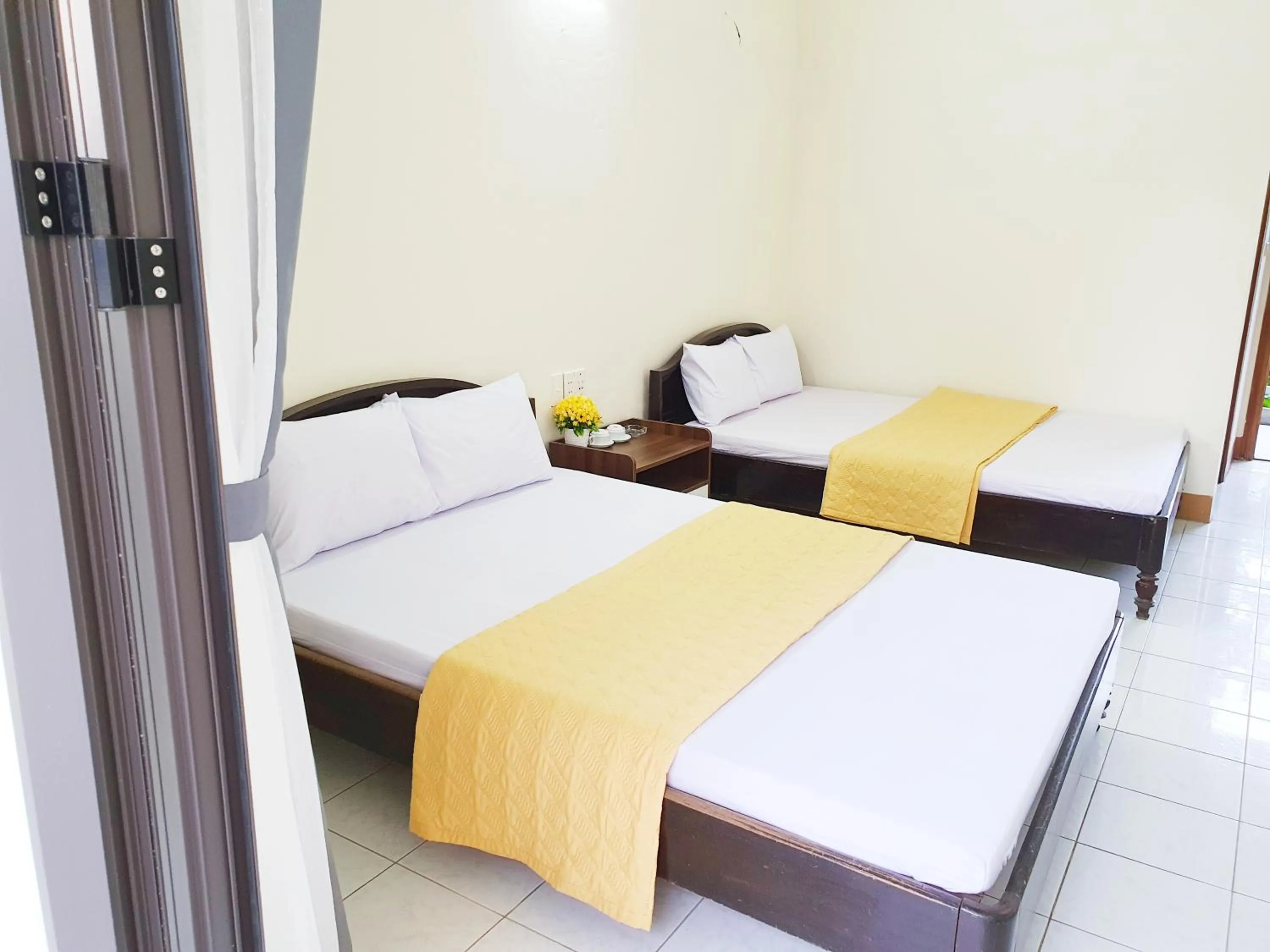 Bed in Khách Sạn Tuấn Thảo Cửa Lò