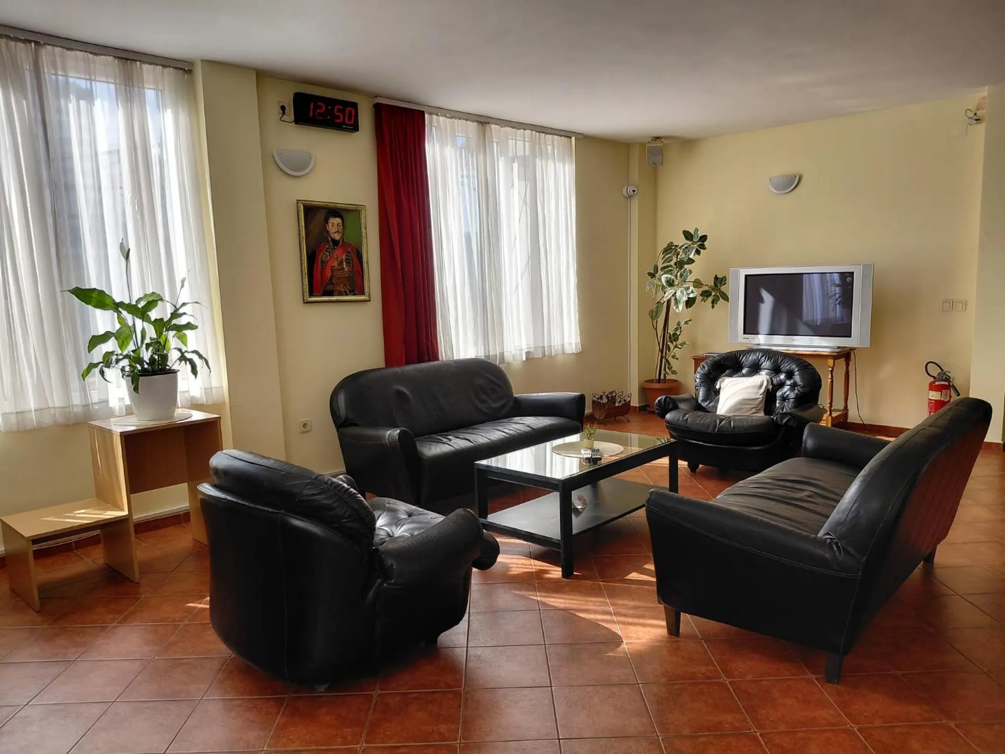 Communal lounge/ TV room in Hotel Slodes