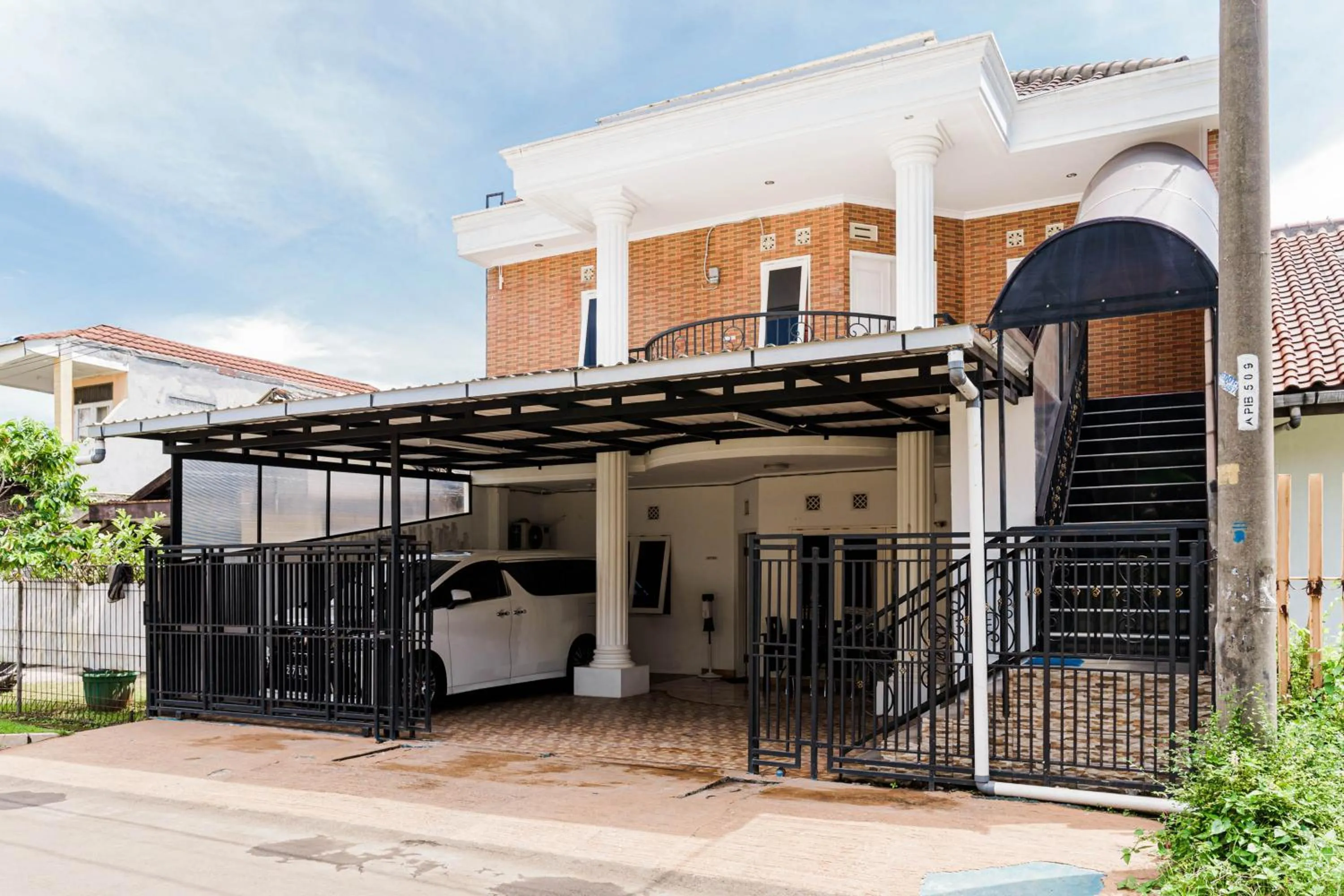 Facade/entrance in Fast Hous Syariah Bogor Mitra RedDoorz