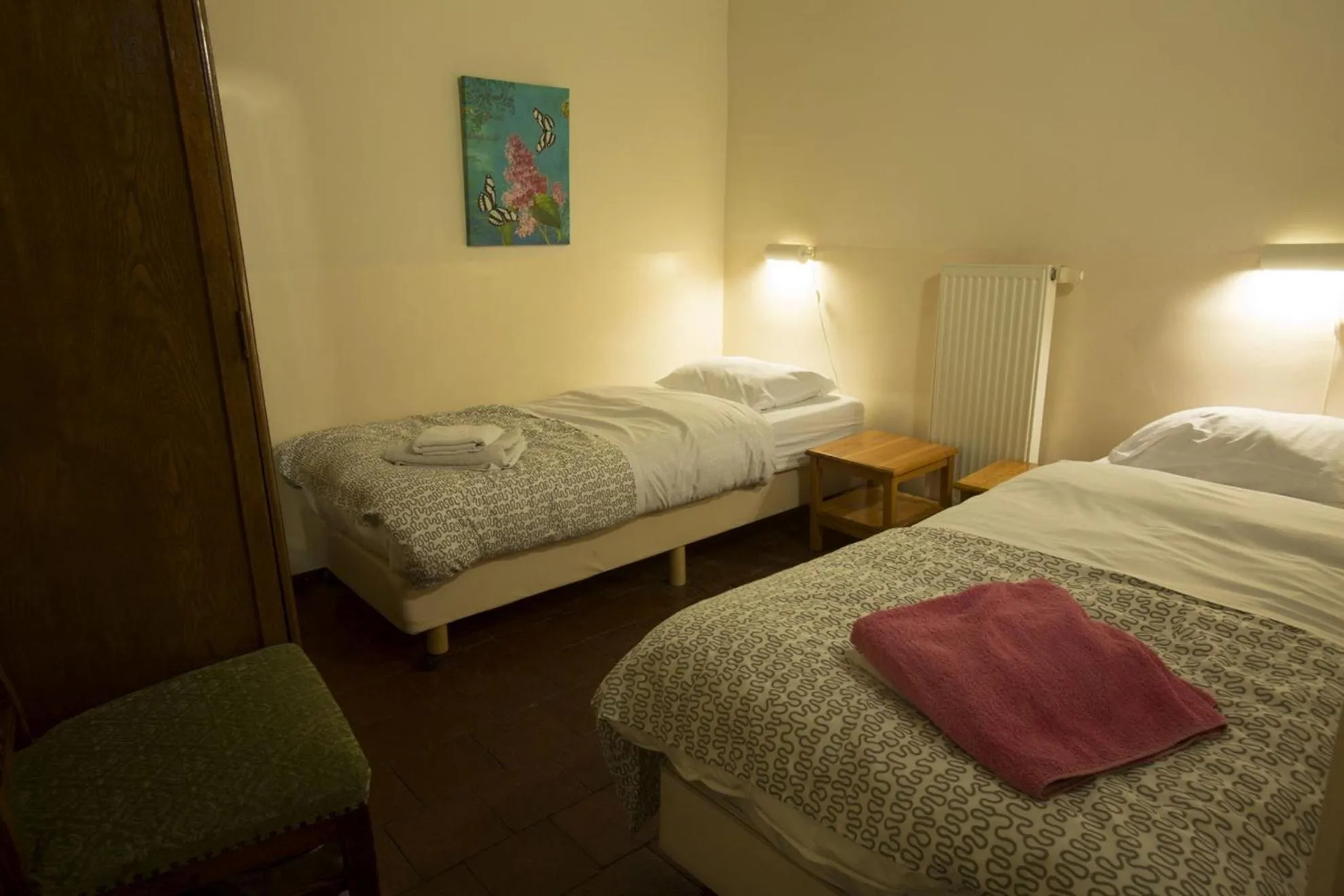 Bed in Apartments Cour d'Aix