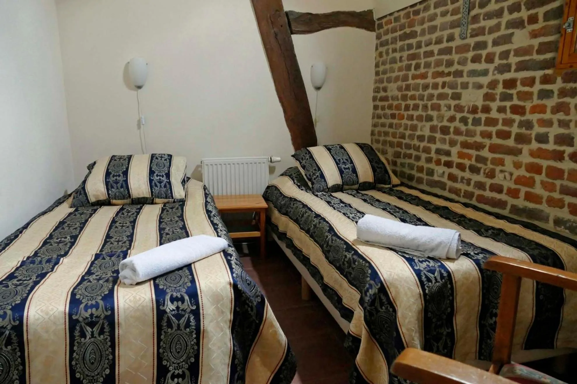 Bed in Apartments Cour d'Aix