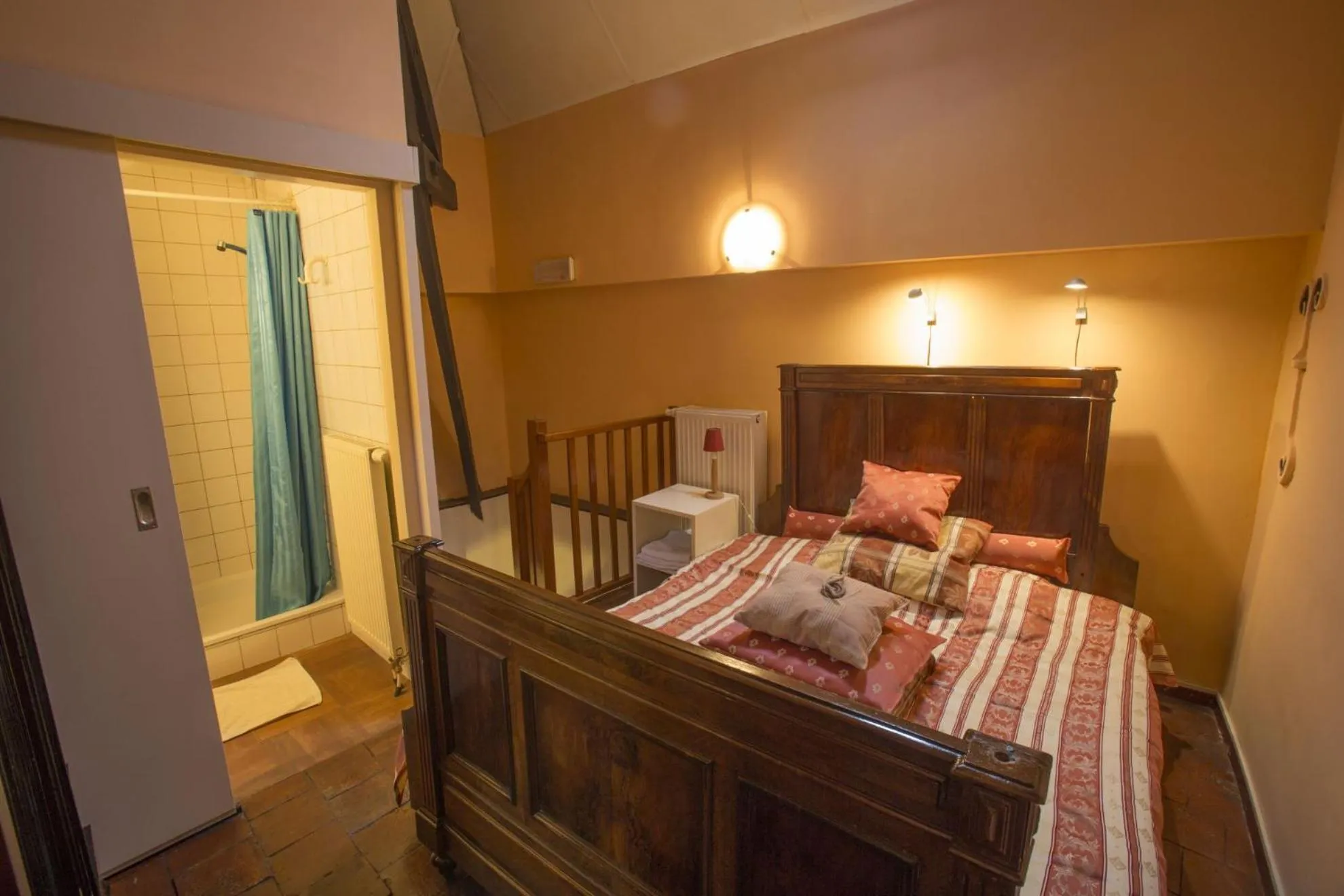 Bed in Apartments Cour d'Aix