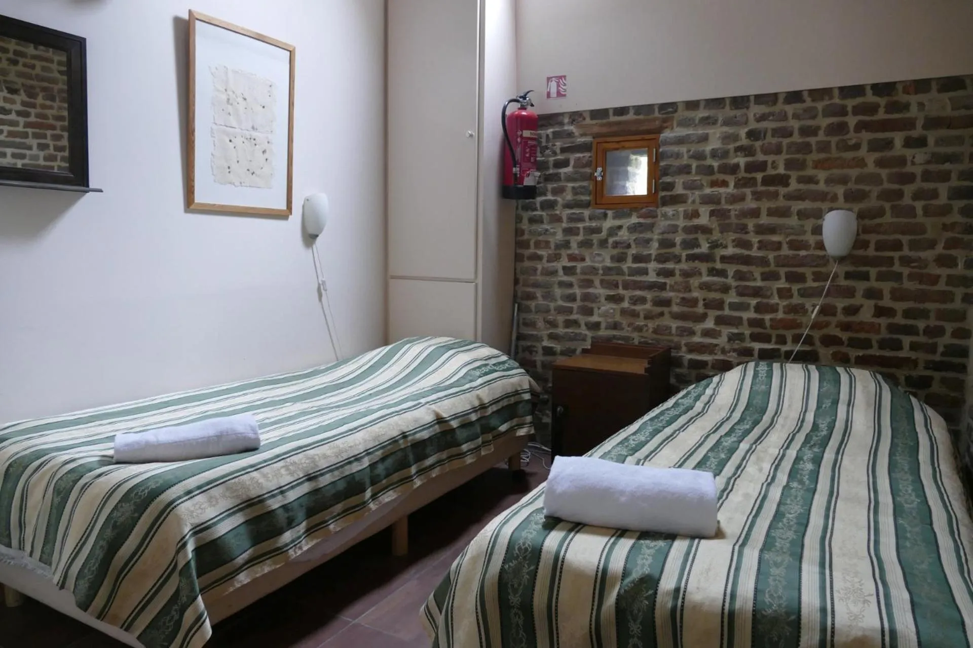 Bed in Apartments Cour d'Aix