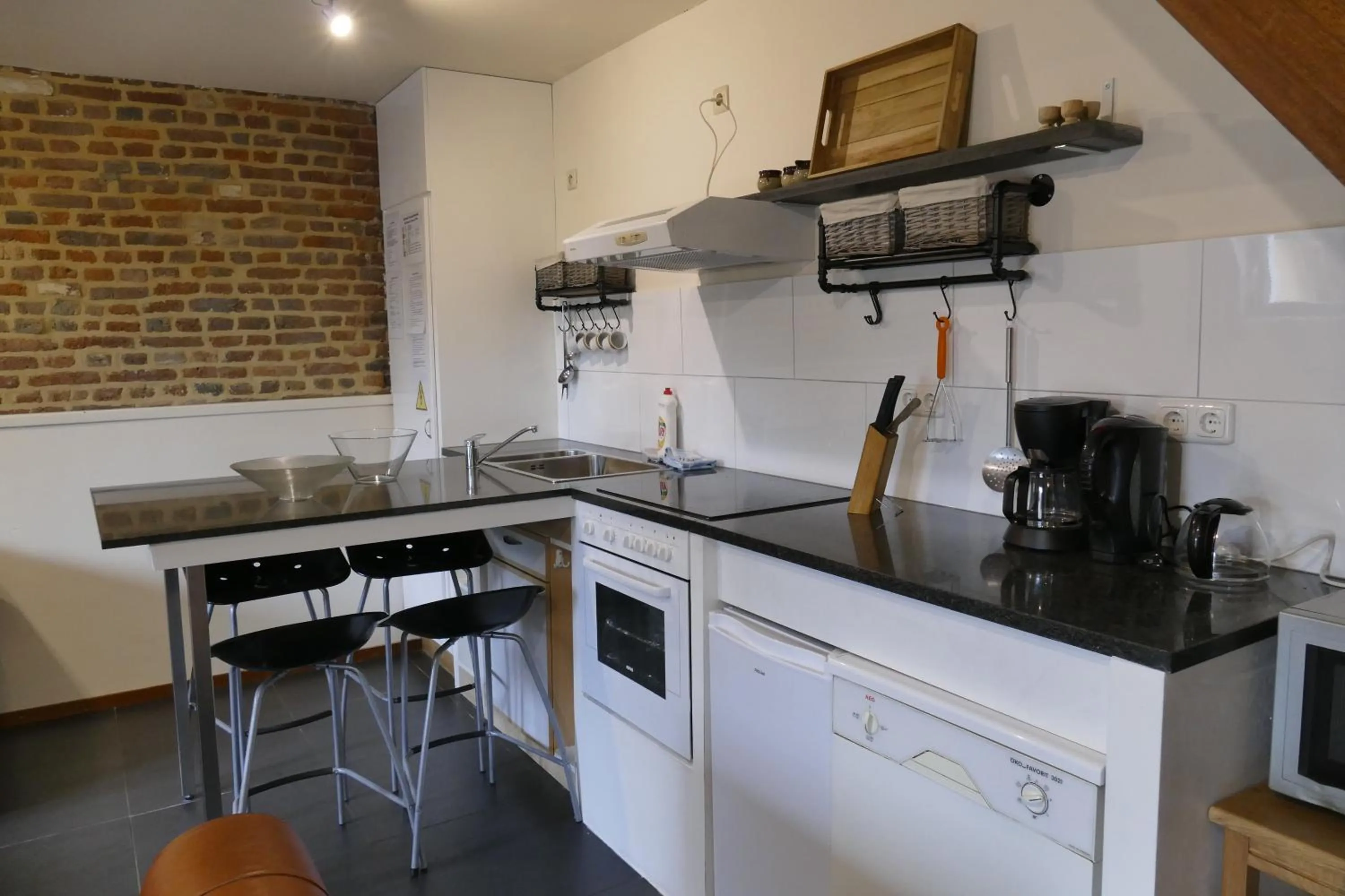 Kitchen or kitchenette in Apartments Cour d'Aix