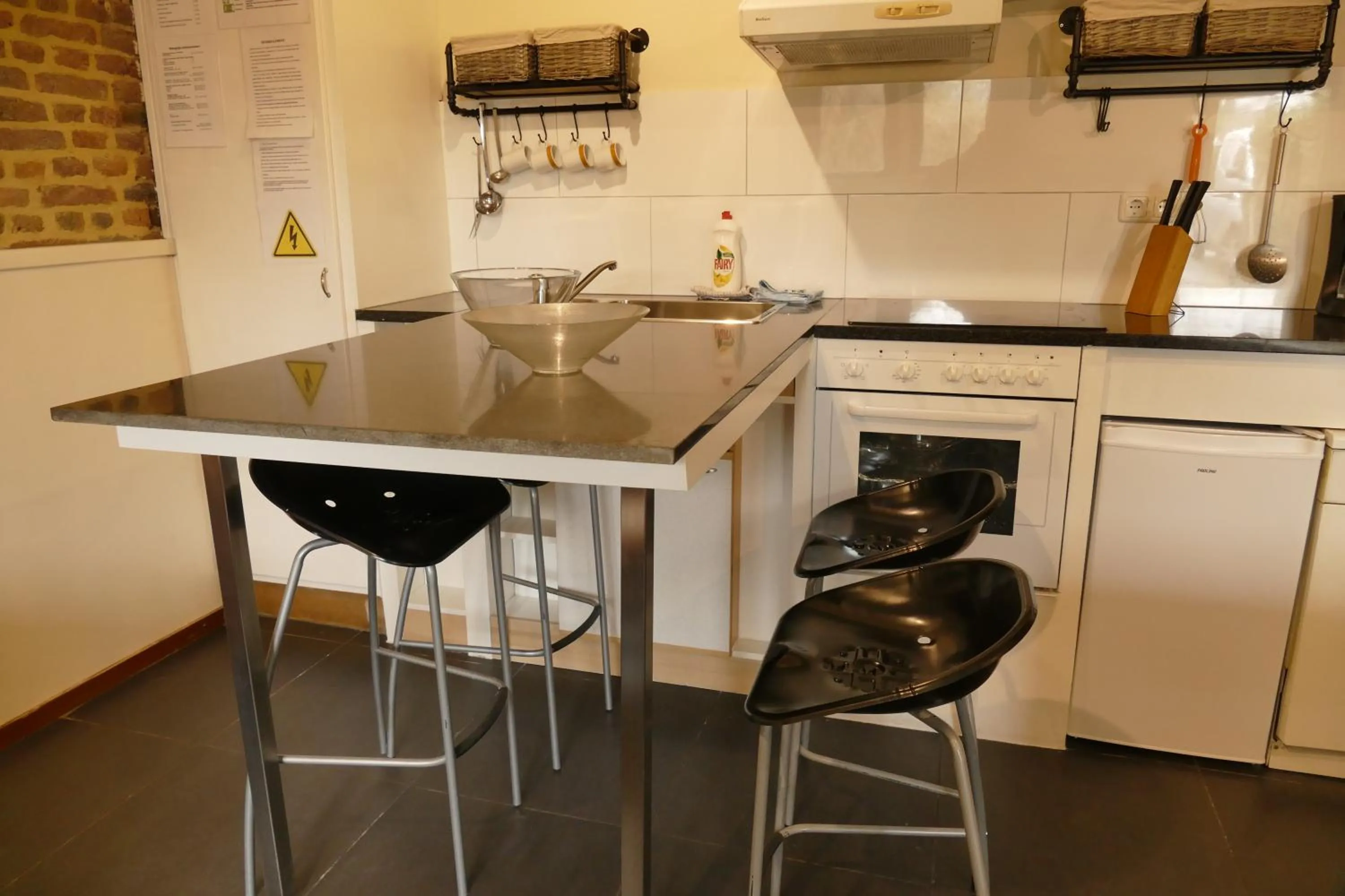 Kitchen or kitchenette in Apartments Cour d'Aix