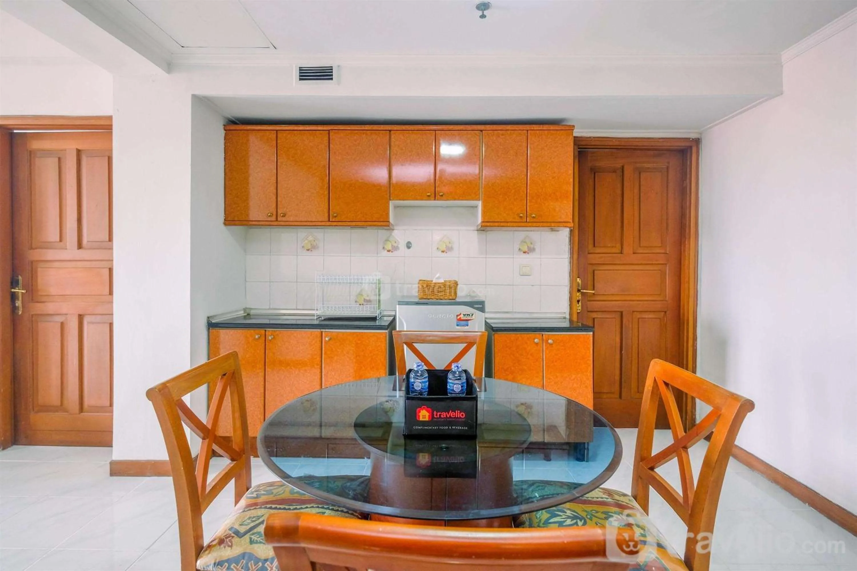 Bed in Spacious and Strategic 3BR Kondominium Juanda Apartment By Travelio