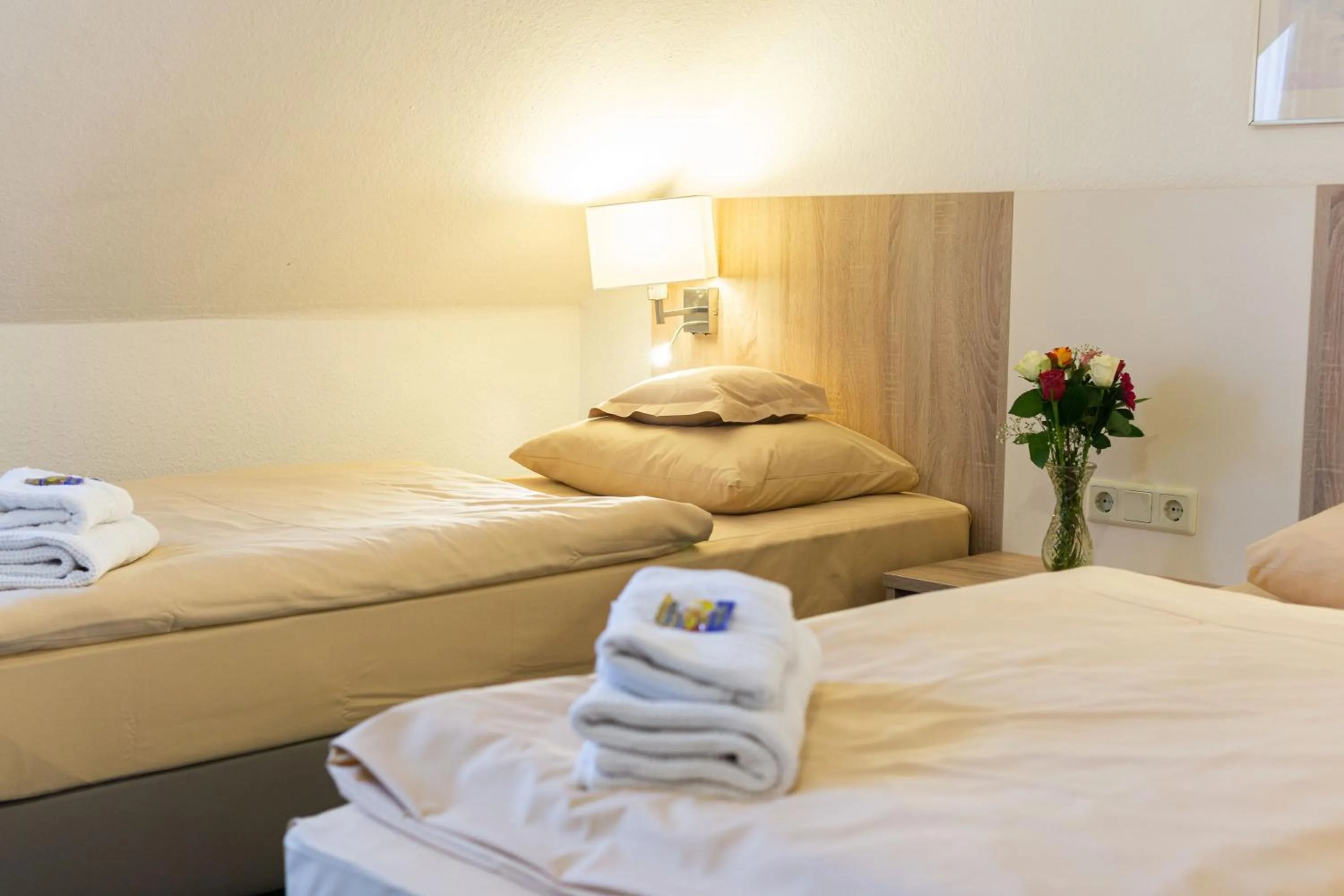 Photo of the whole room, Bed in Hotel Kelkheimer Hof