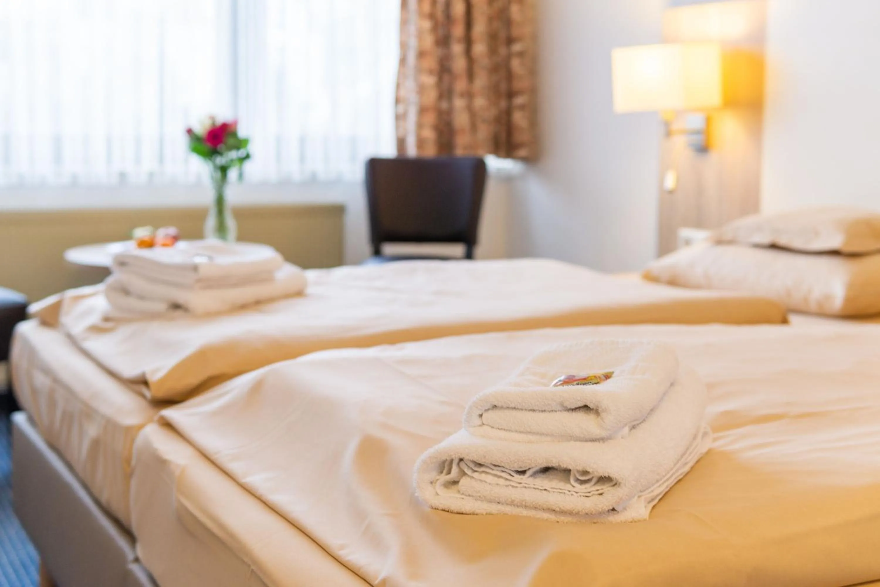 Photo of the whole room, Bed in Hotel Kelkheimer Hof