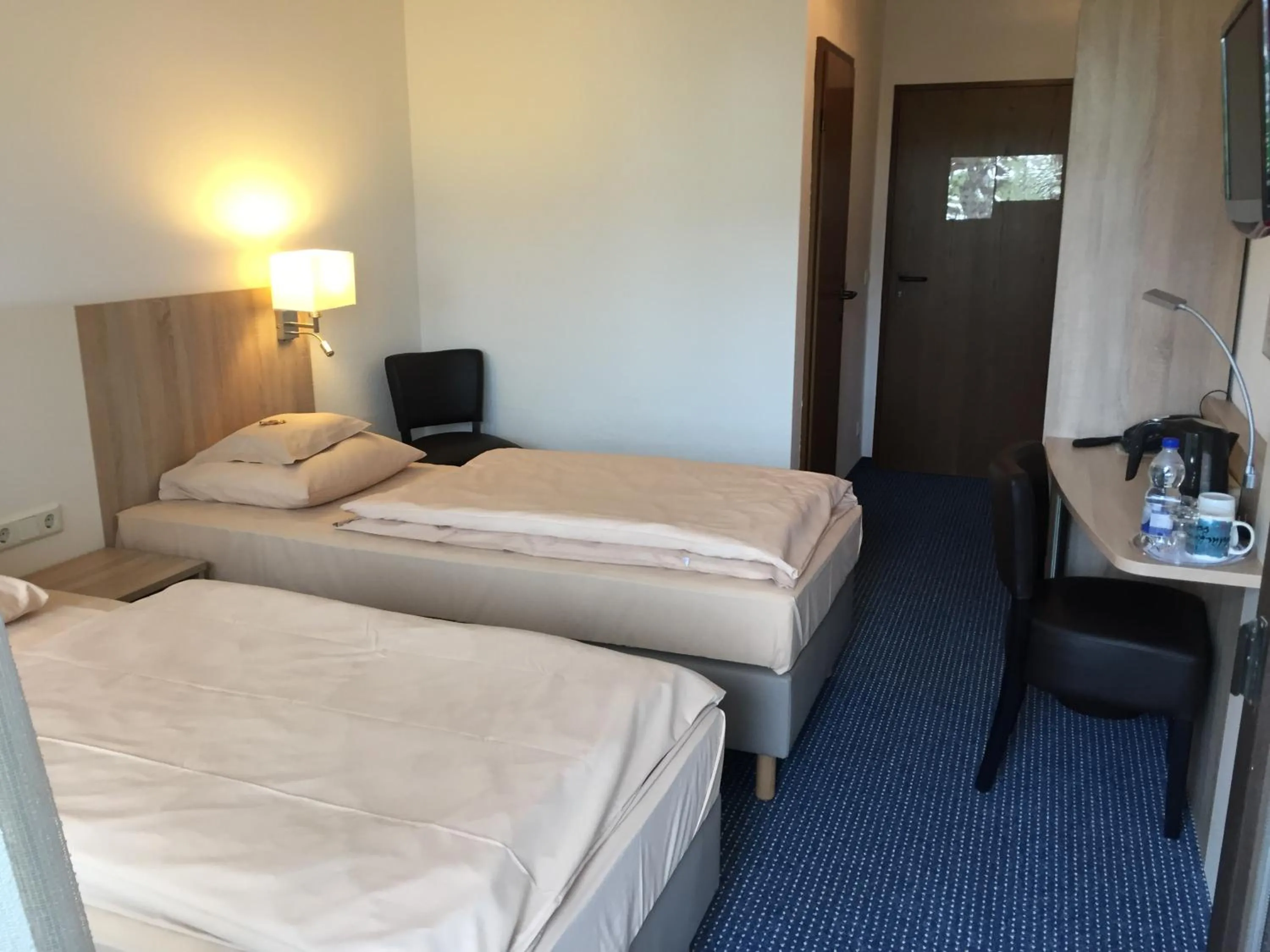 Photo of the whole room, Bed in Hotel Kelkheimer Hof