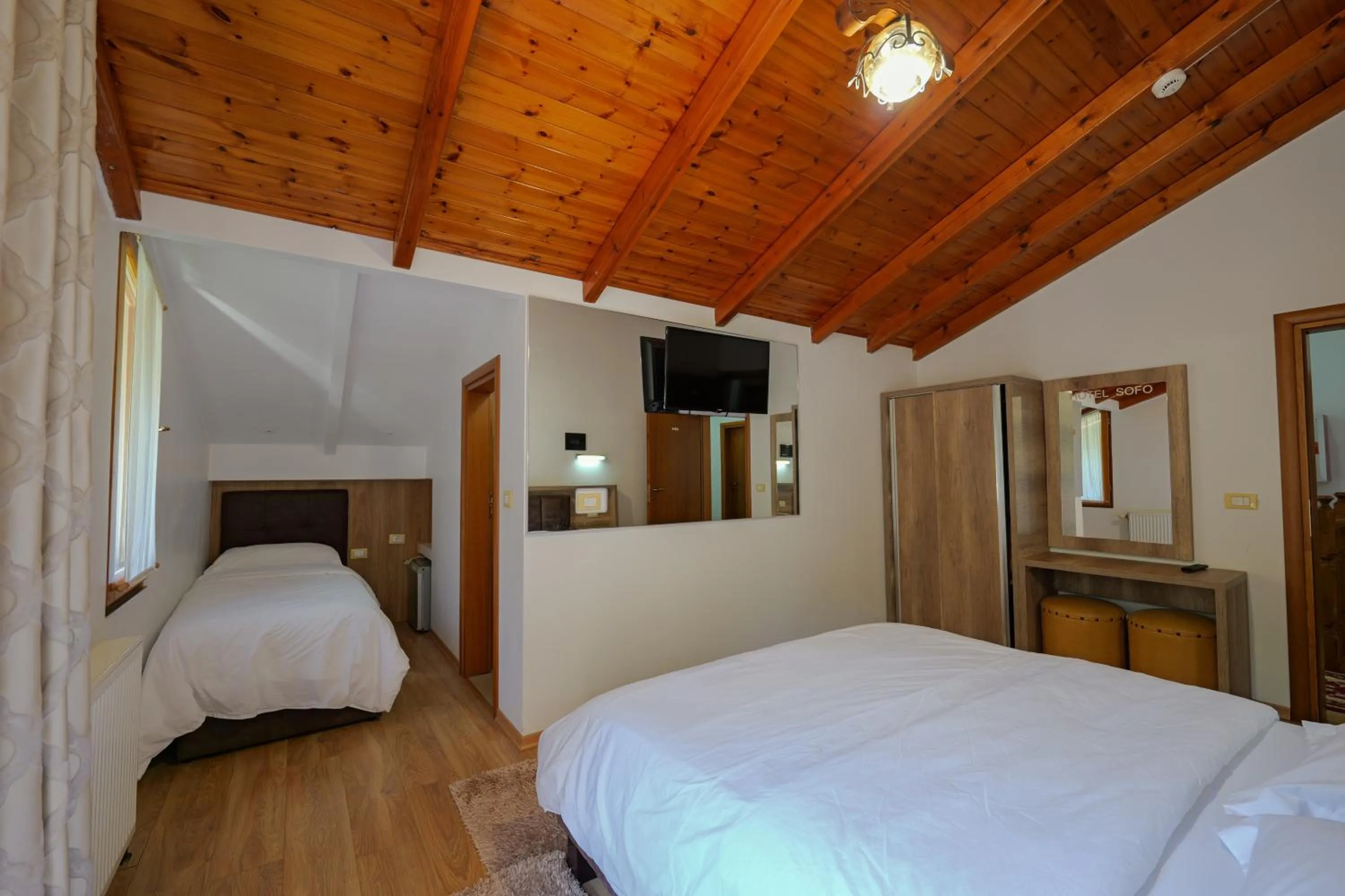 Communal lounge/ TV room in Hotel Sofo