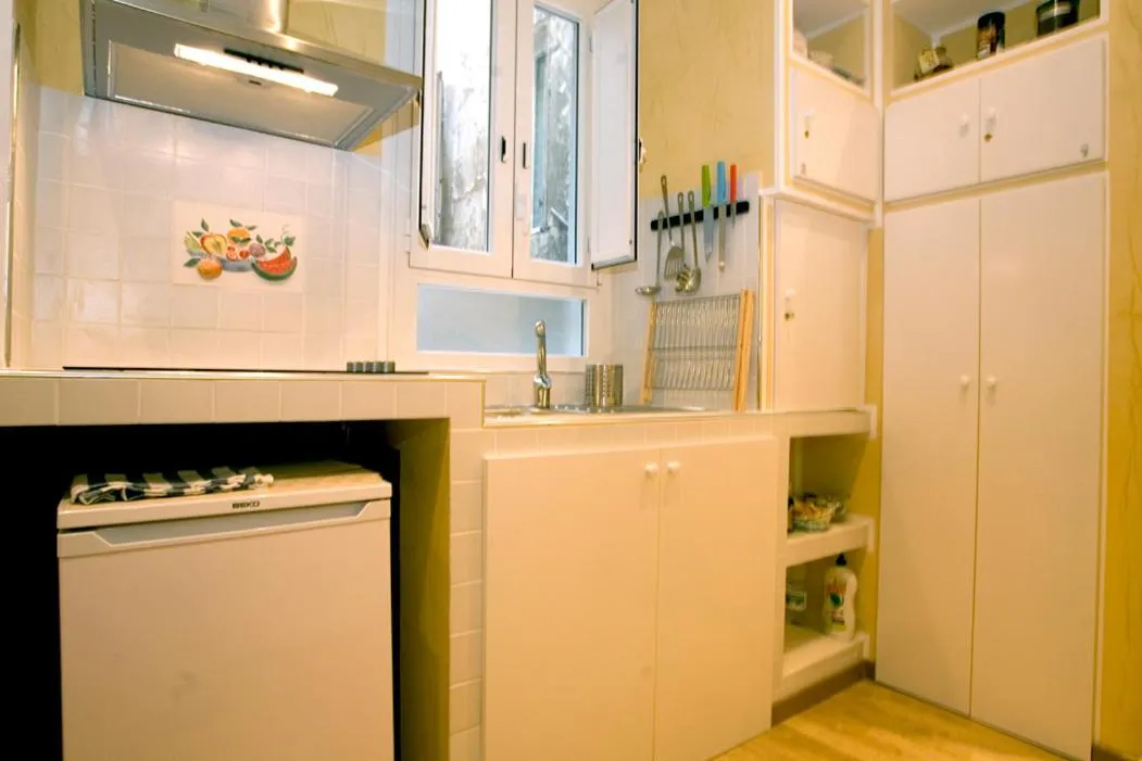 Kitchen or kitchenette in B&B In Piazza