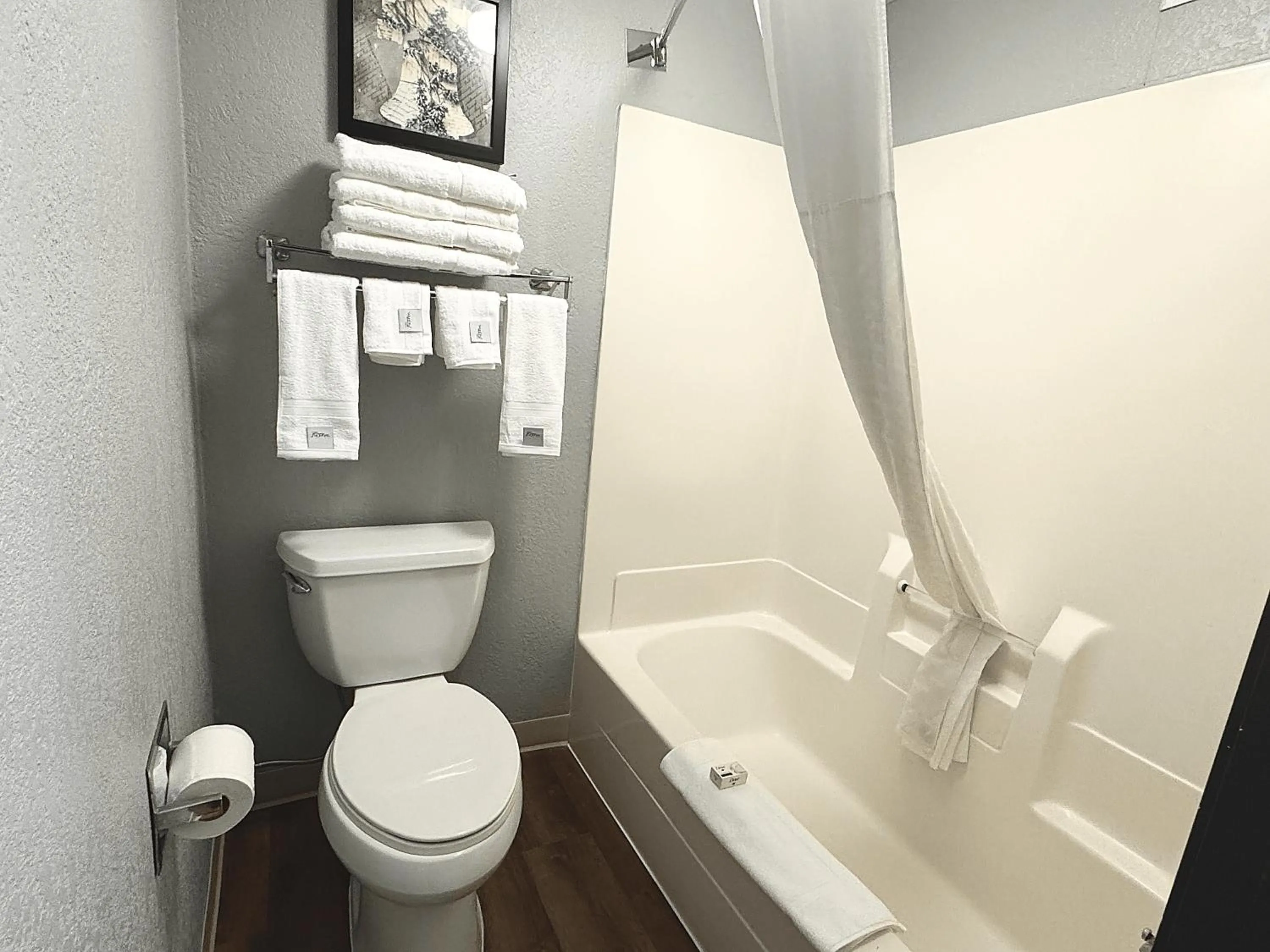 Bathroom in AmericInn by Wyndham Ames