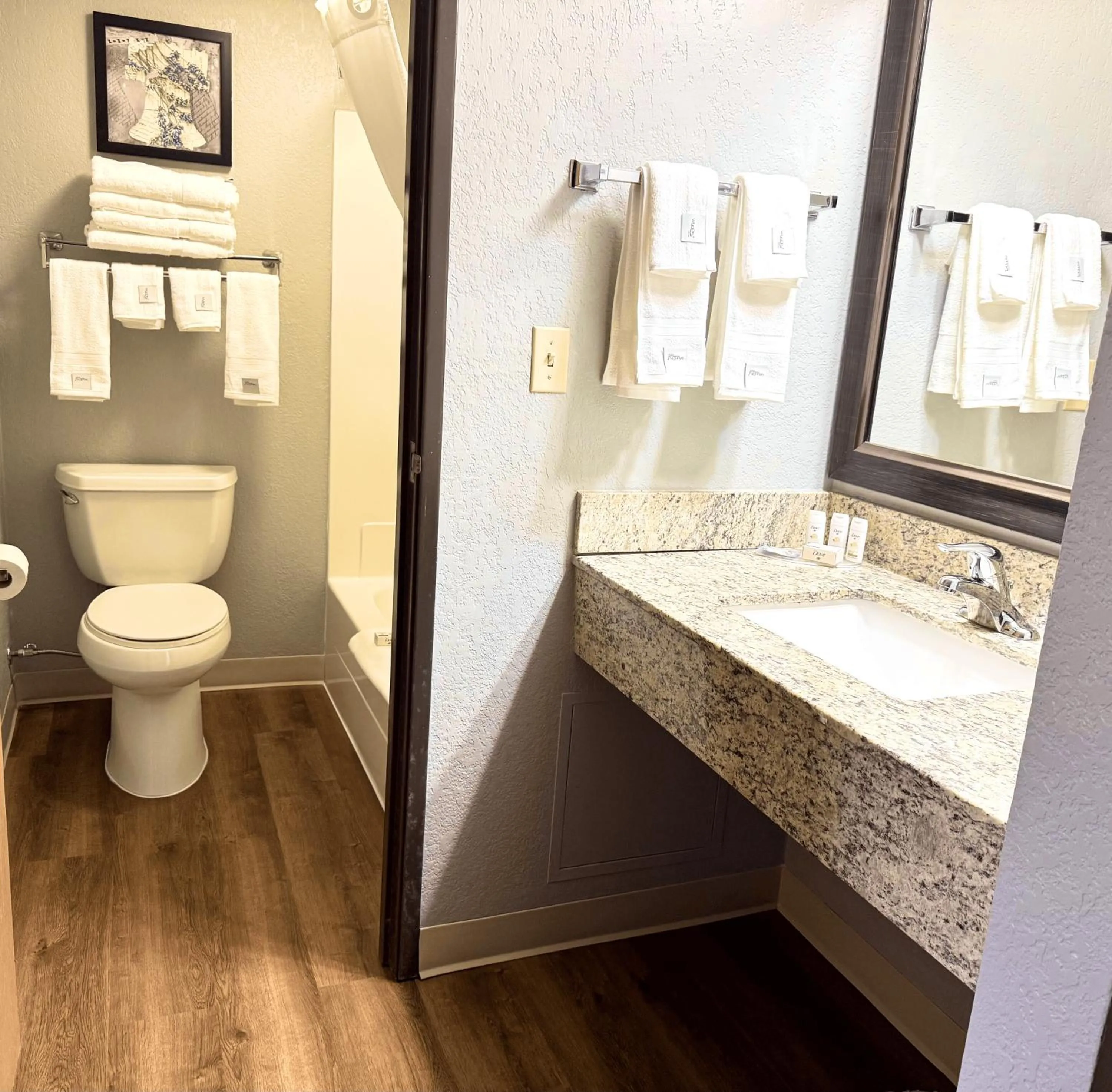 Bathroom in AmericInn by Wyndham Ames