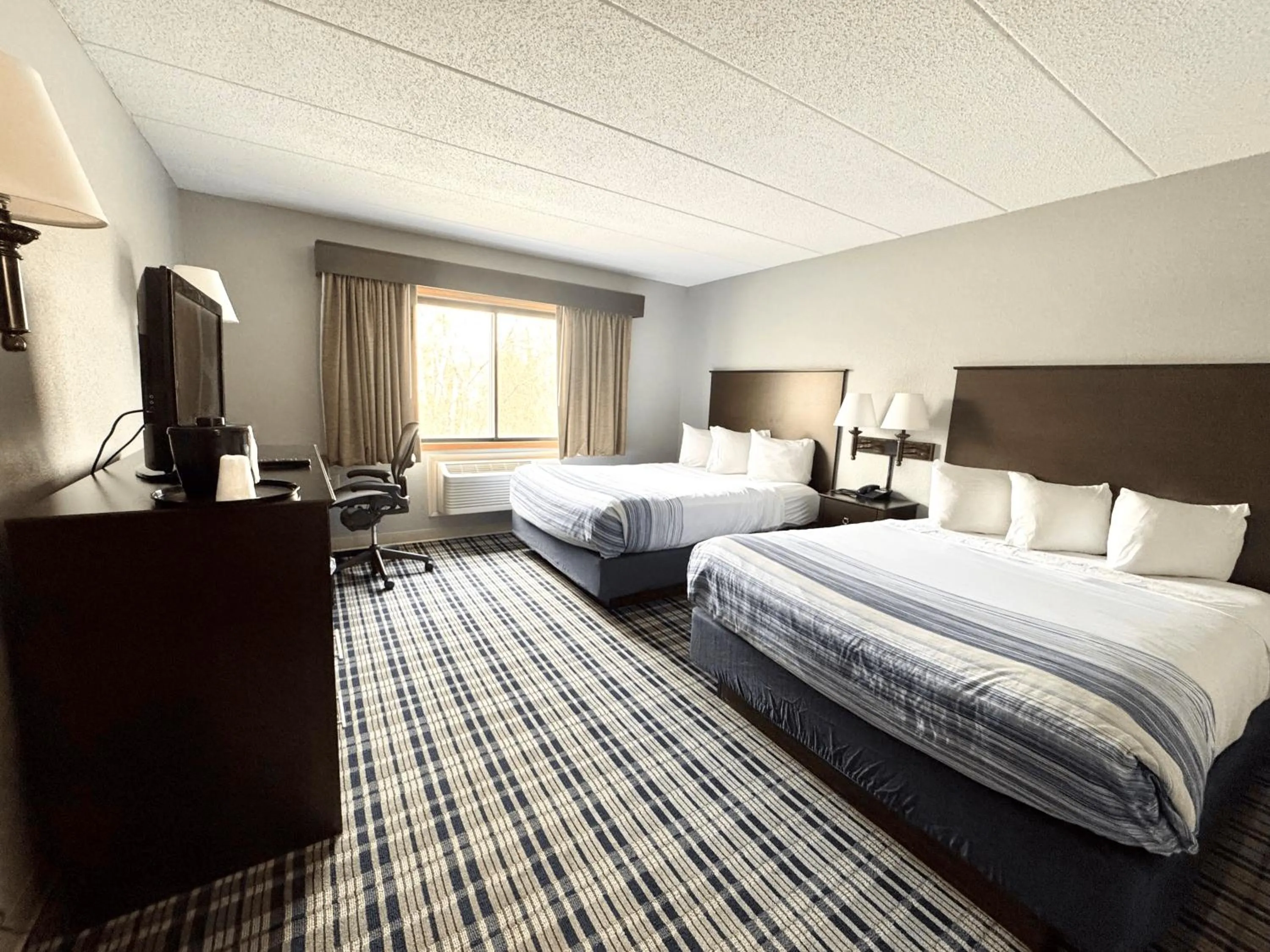 Bedroom, Bed in AmericInn by Wyndham Ames