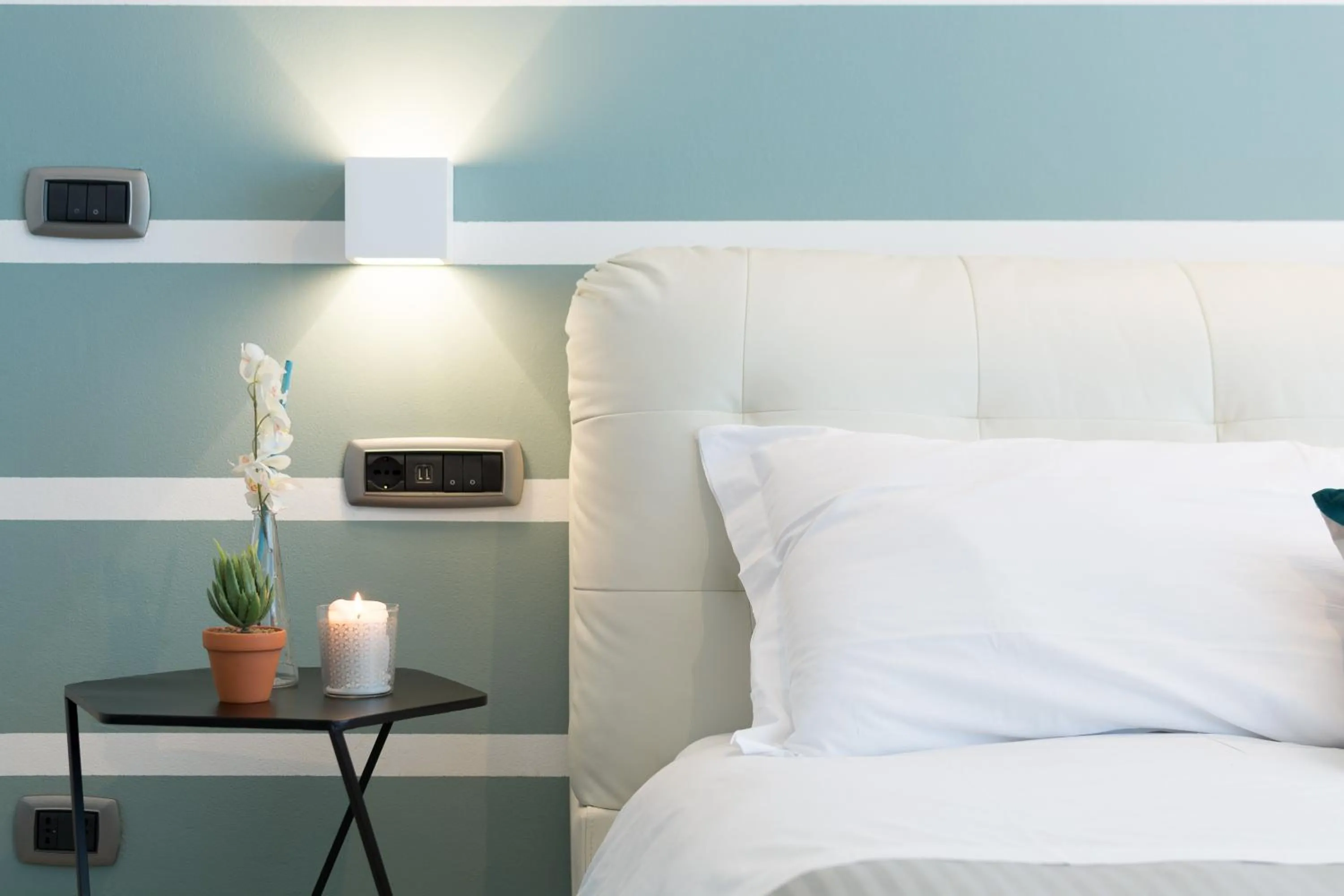 Decorative detail, Bed in 4 Star Bologna Train Station - Self Check-In