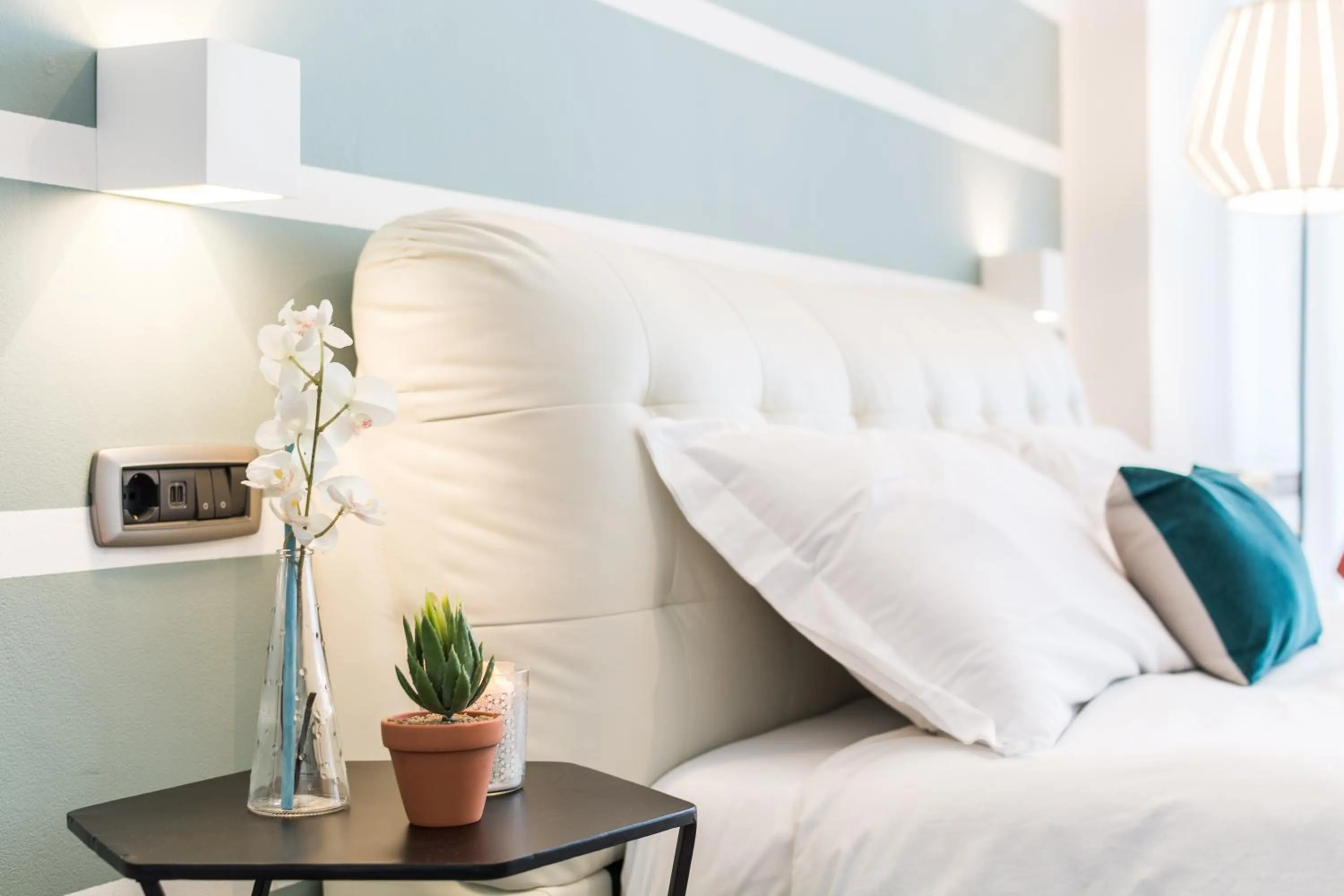 Decorative detail, Bed in 4 Star Bologna Train Station - Self Check-In