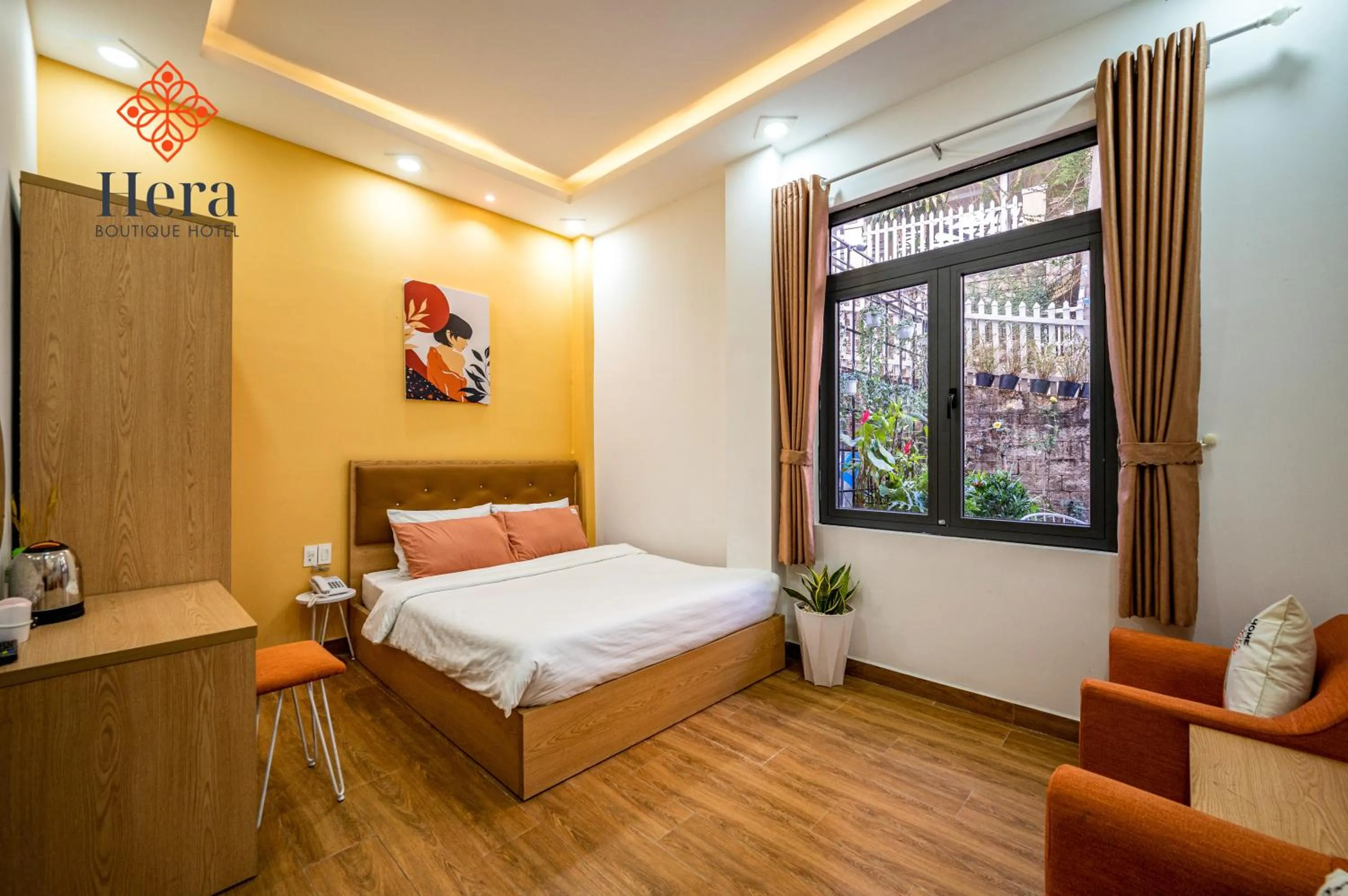 Bed in Hera Boutique Hotel