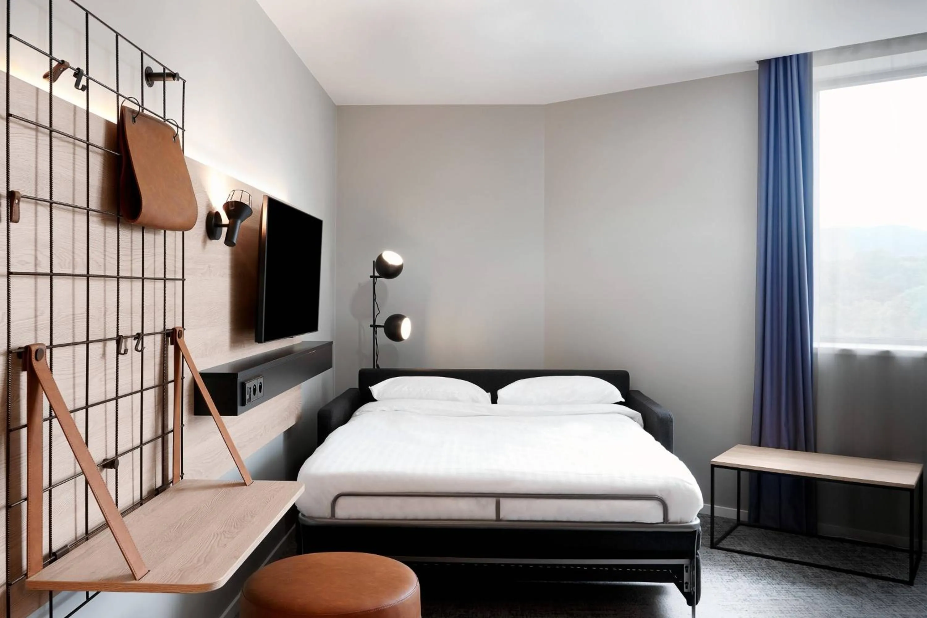 Photo of the whole room, Bed in Moxy Sophia Antipolis