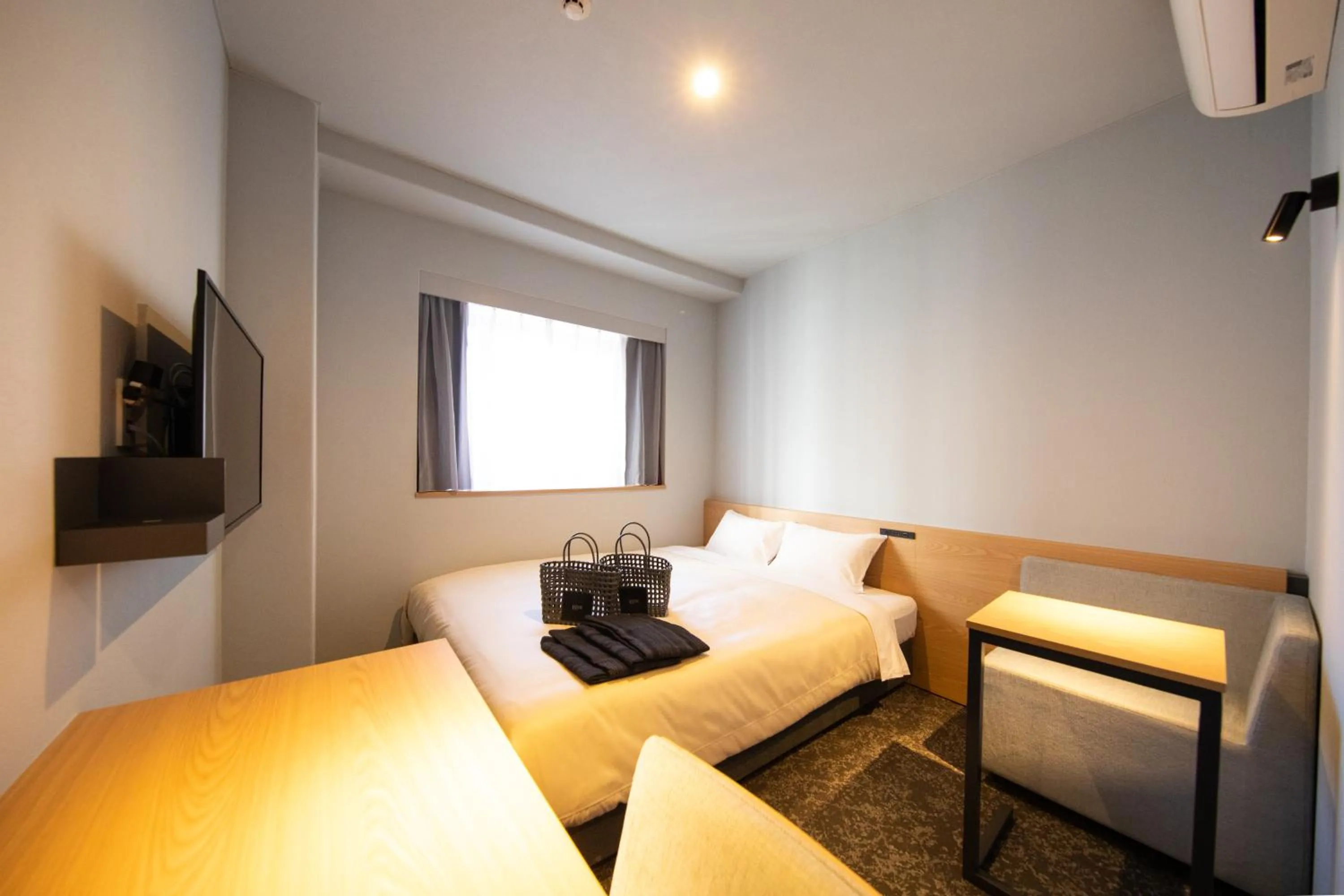 Photo of the whole room, Bed in AMANEK Inn Beppu