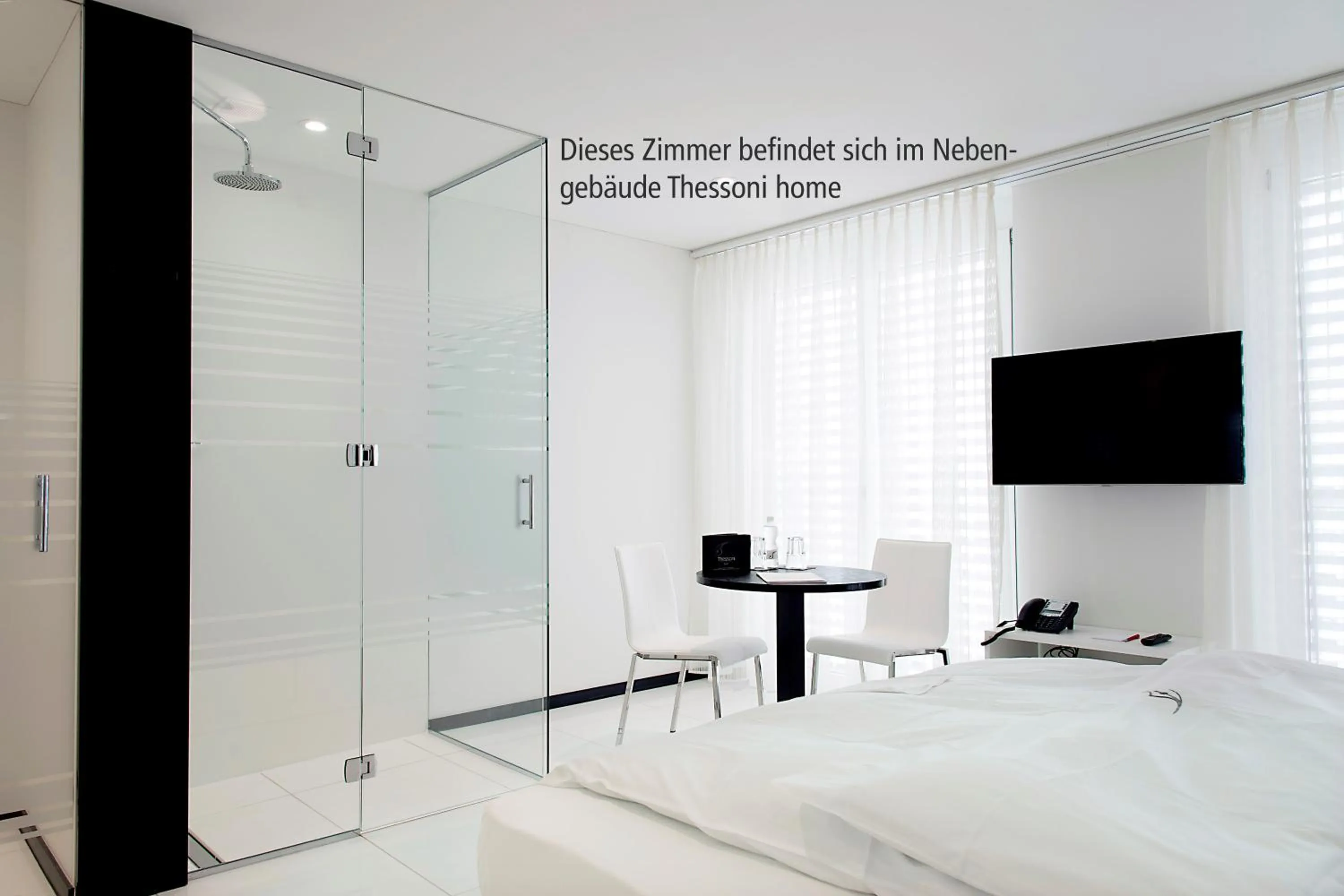 Photo of the whole room, Bed in Boutiquehotel Thessoni Classic & Self service Residence Home Zürich