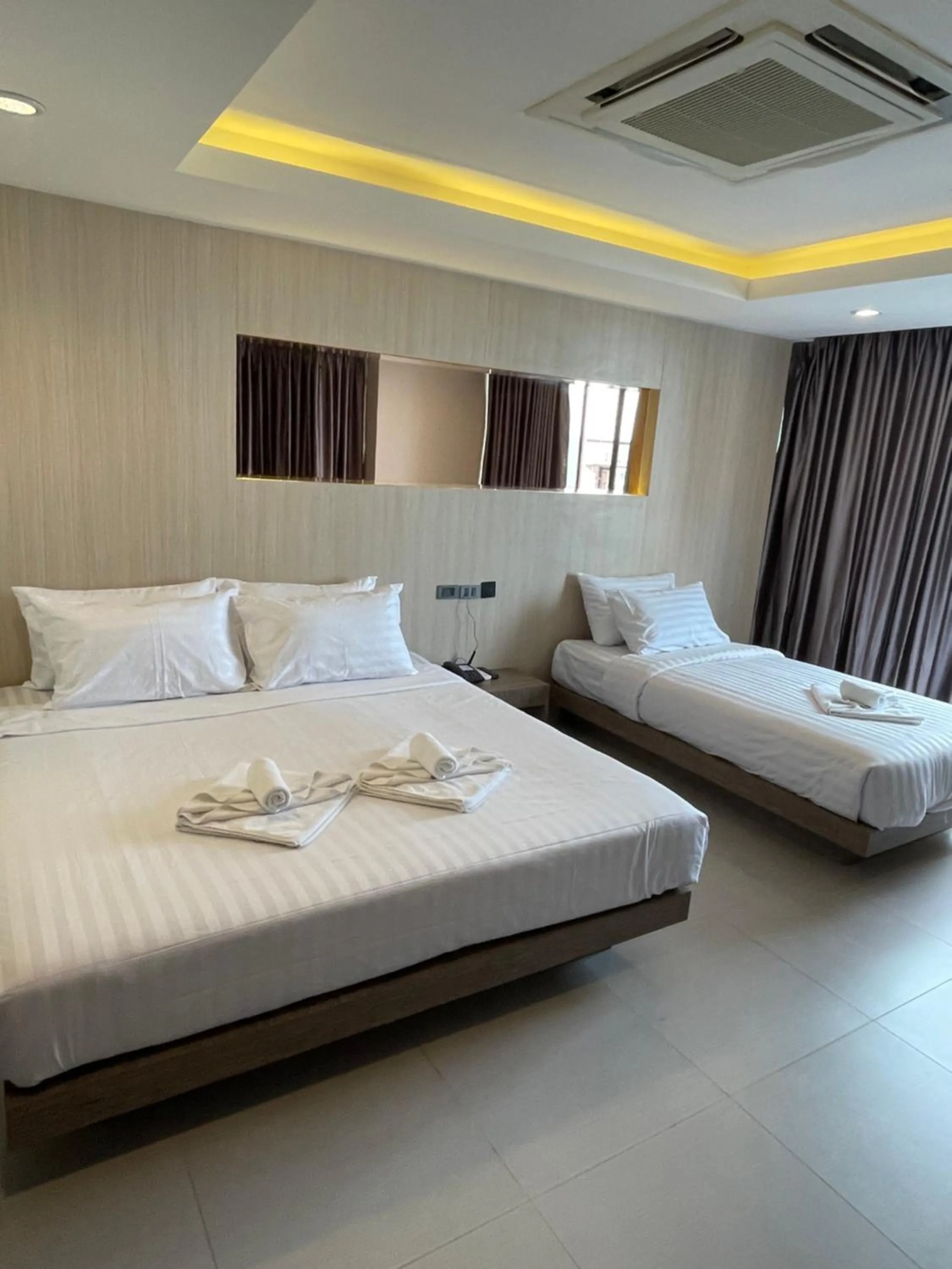 Bed in Hermann Hotel Pattaya - SHA Extra Plus