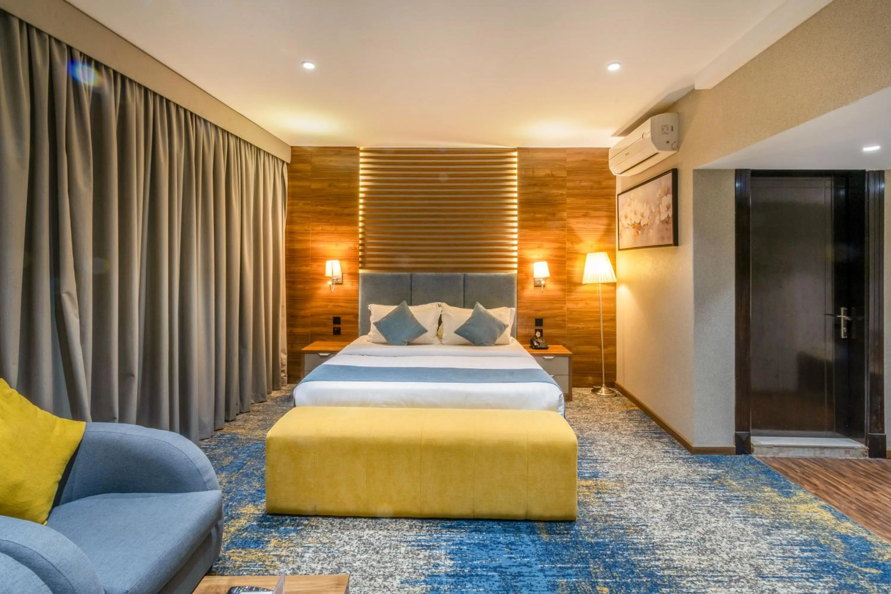 Bed in Almsakn Alola Hotel Company