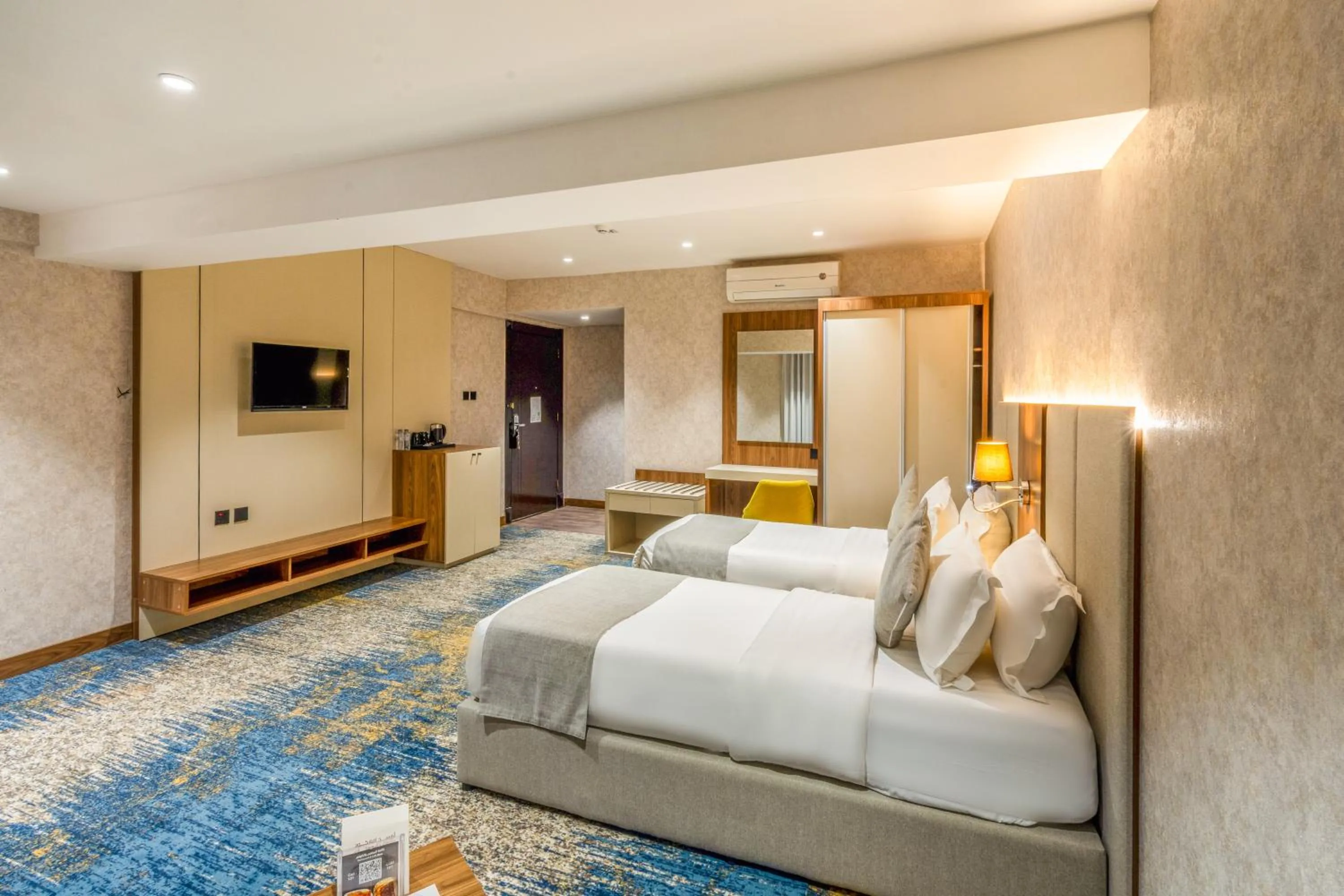 Bed in Almsakn Alola Hotel Company