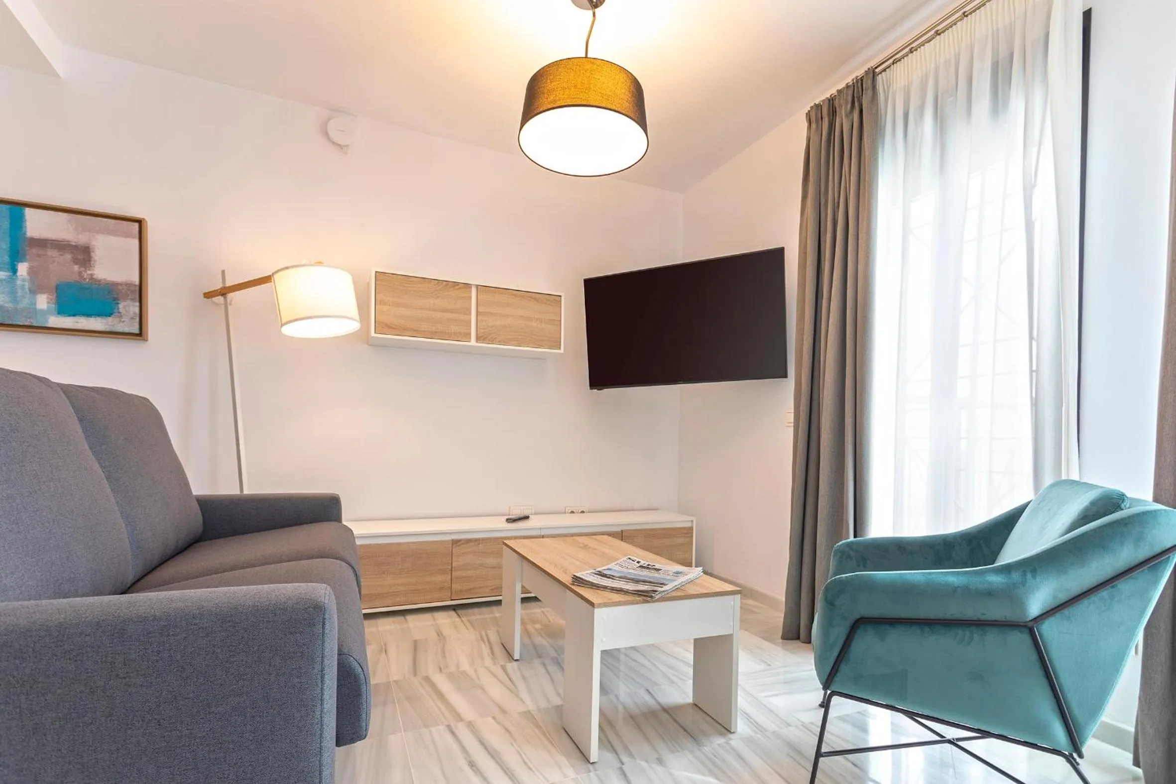 TV and multimedia in Málaga Rivas 34 Suites Homes