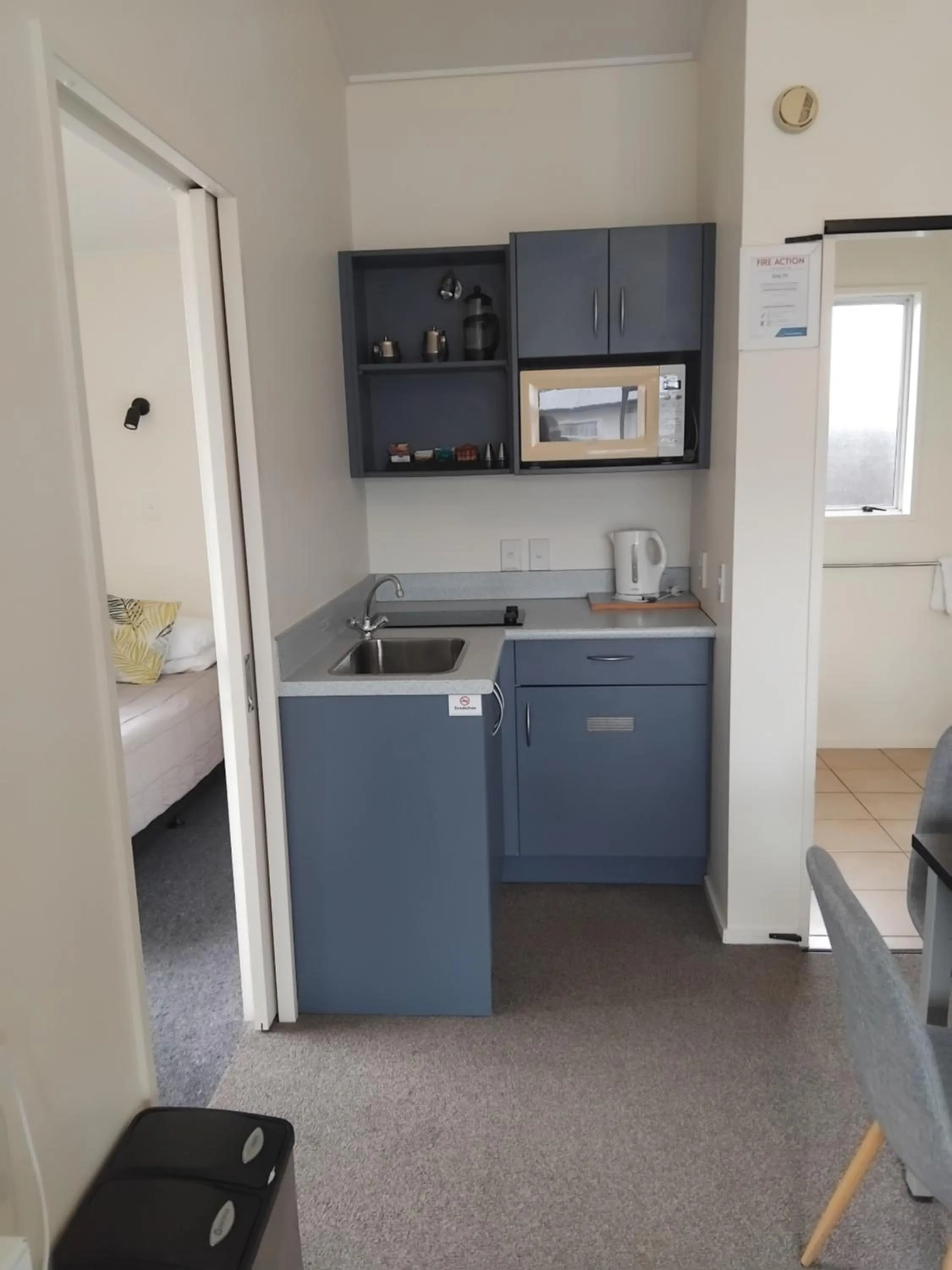 Kitchen or kitchenette in The Coast Motel