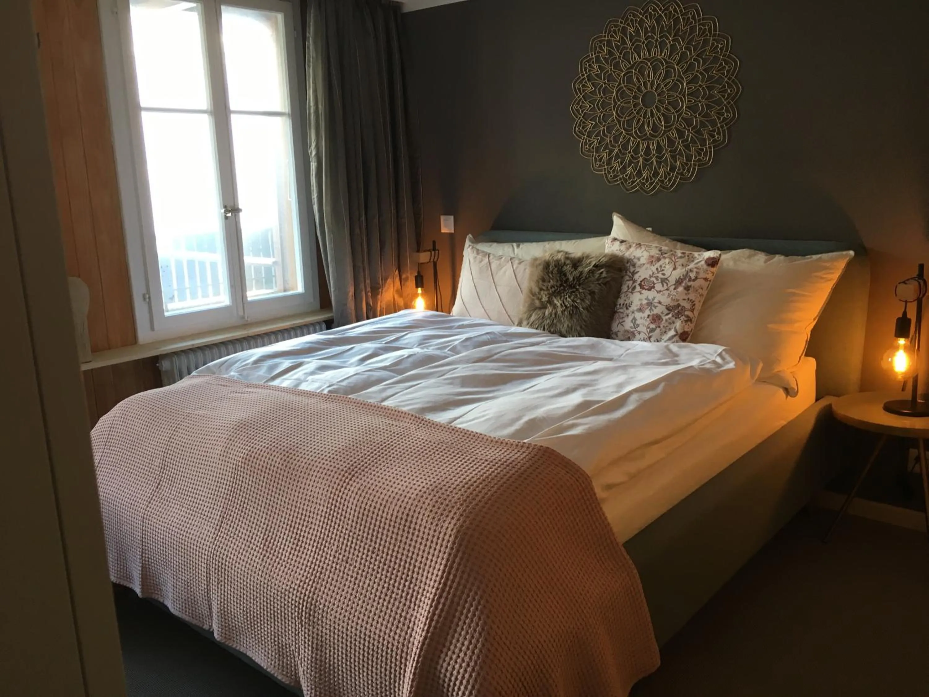 Bed in Boutique Hotel Bellevue B&B am Brienzersee Iseltwald Interlaken