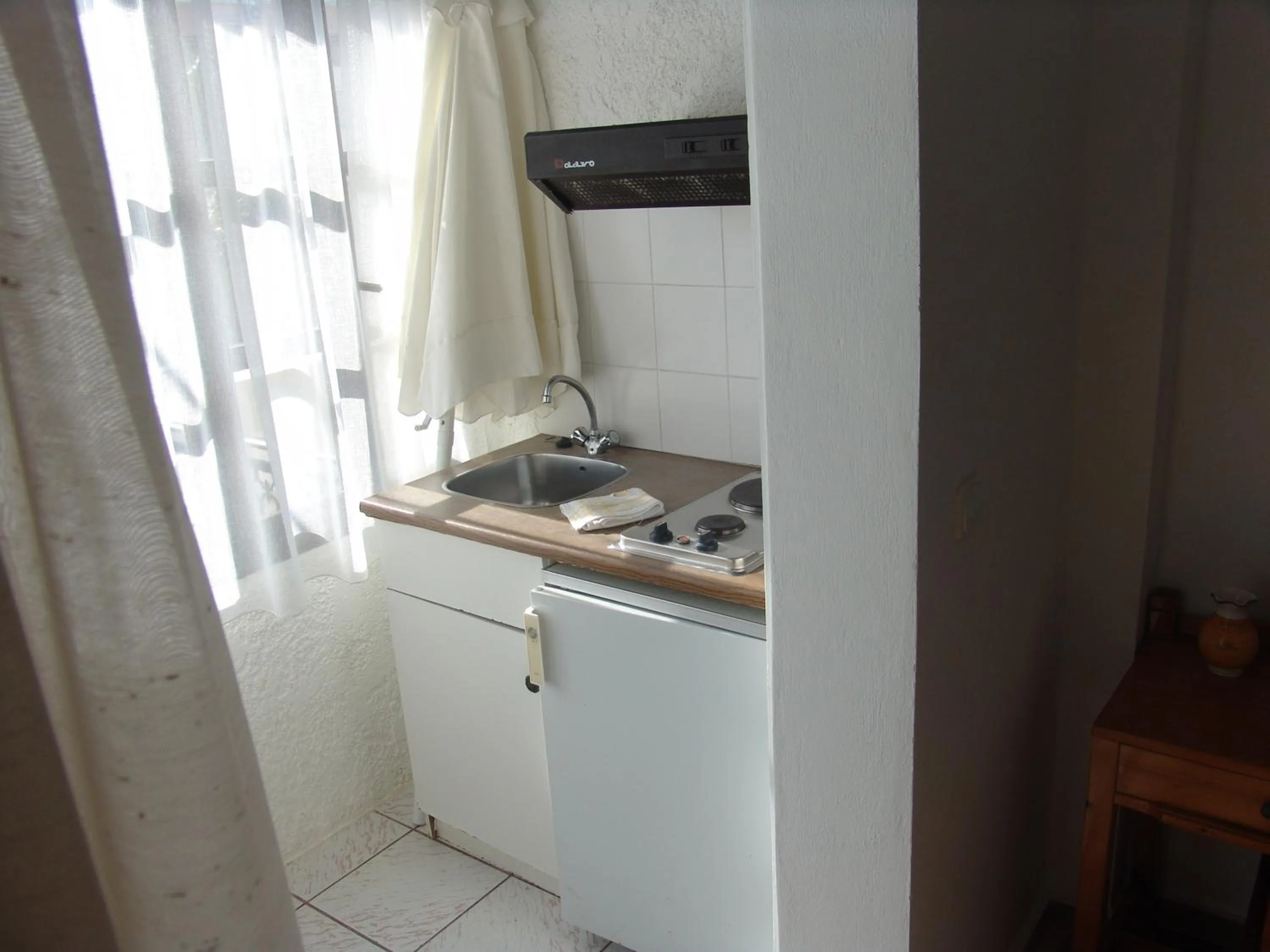 Kitchen or kitchenette in Notis Hotel