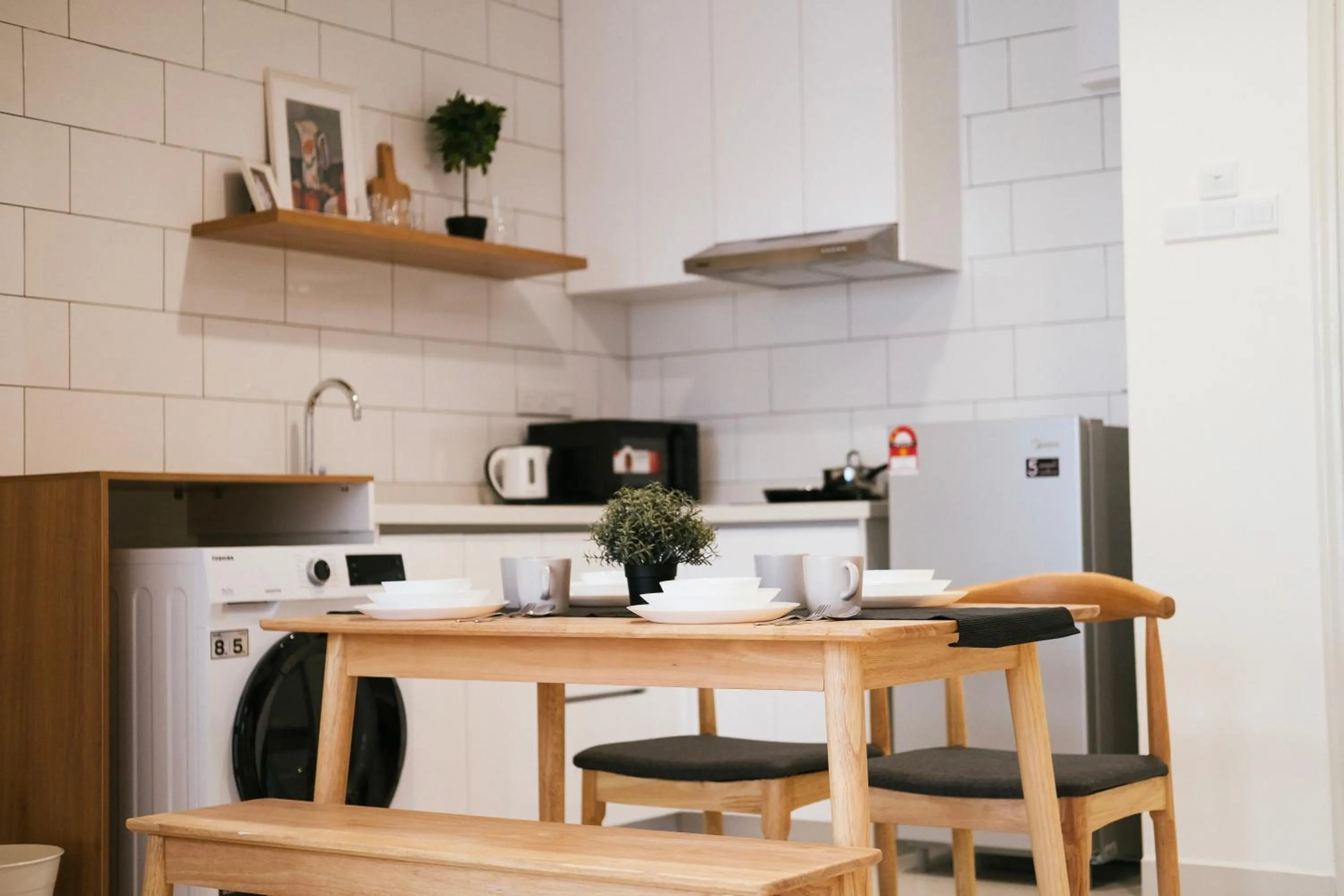 Kitchen or kitchenette in Arte Mont Kiara by CozyNest