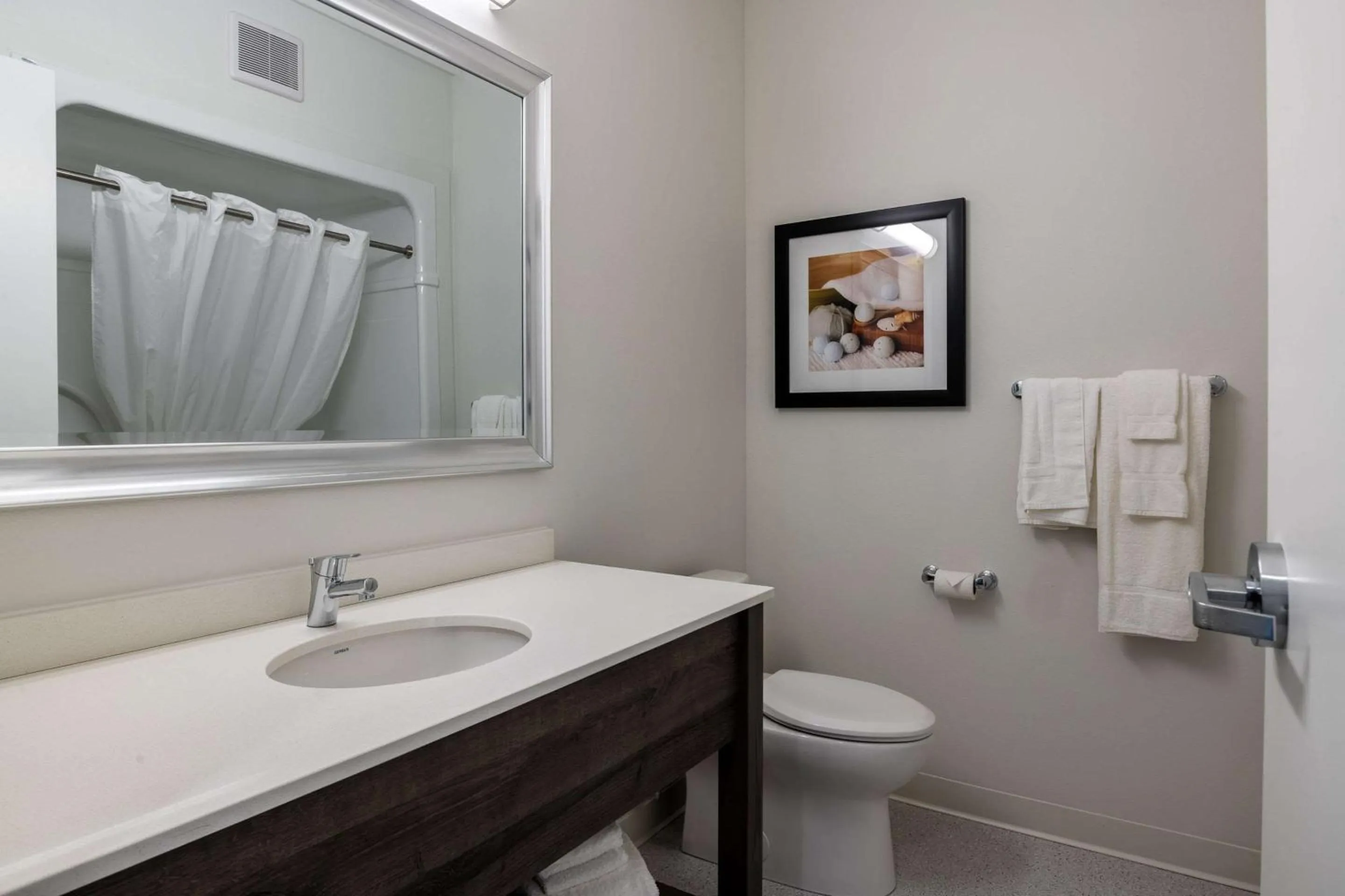 Bedroom in Amsterdam Inn & Suites, an Ascend Collection Hotel