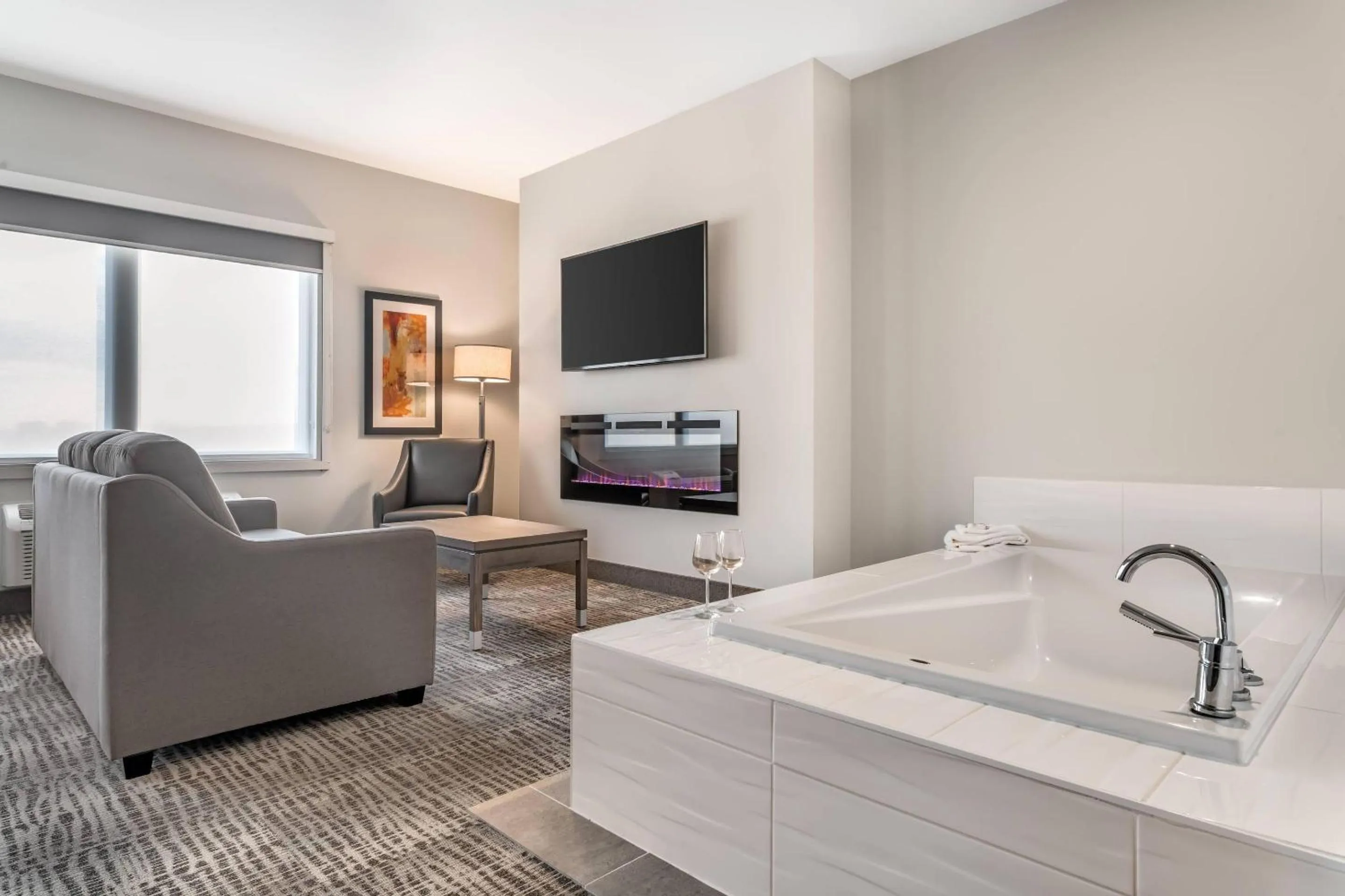 Bedroom, Bed in Amsterdam Inn & Suites, an Ascend Collection Hotel