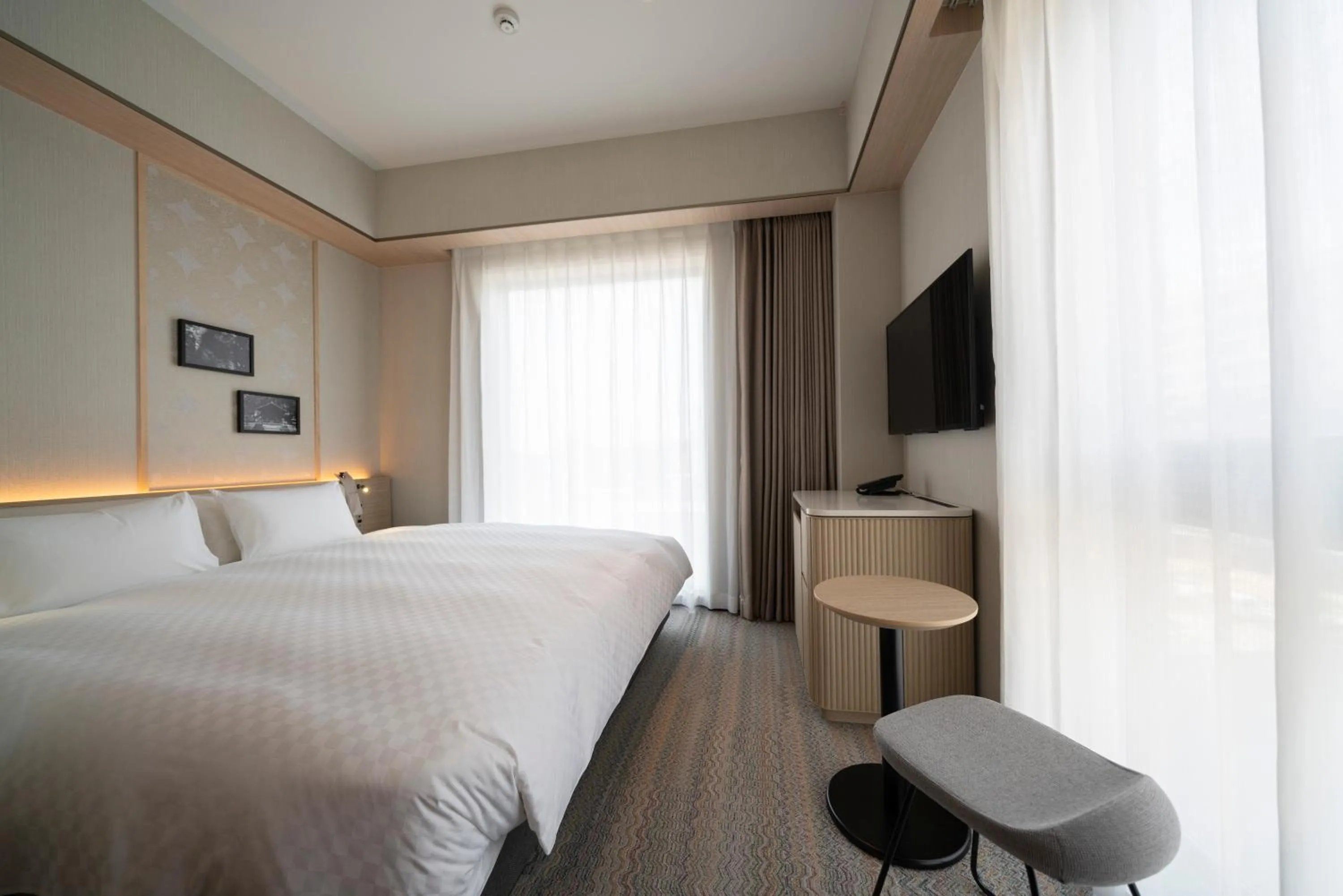 Photo of the whole room, Bed in HOTEL μ STYLE INUYAMA experience