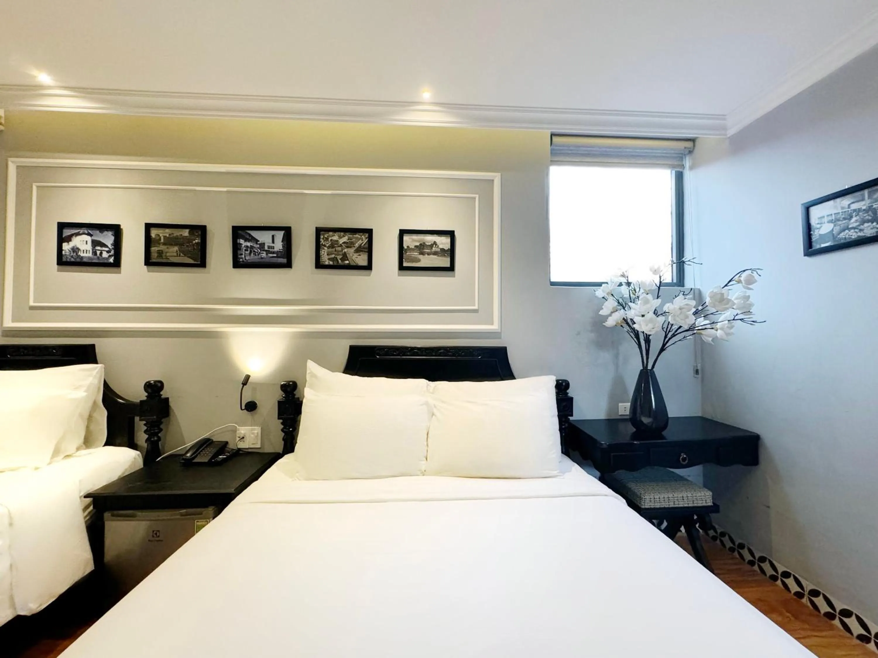 Bed in TTR Skypool View Hotel