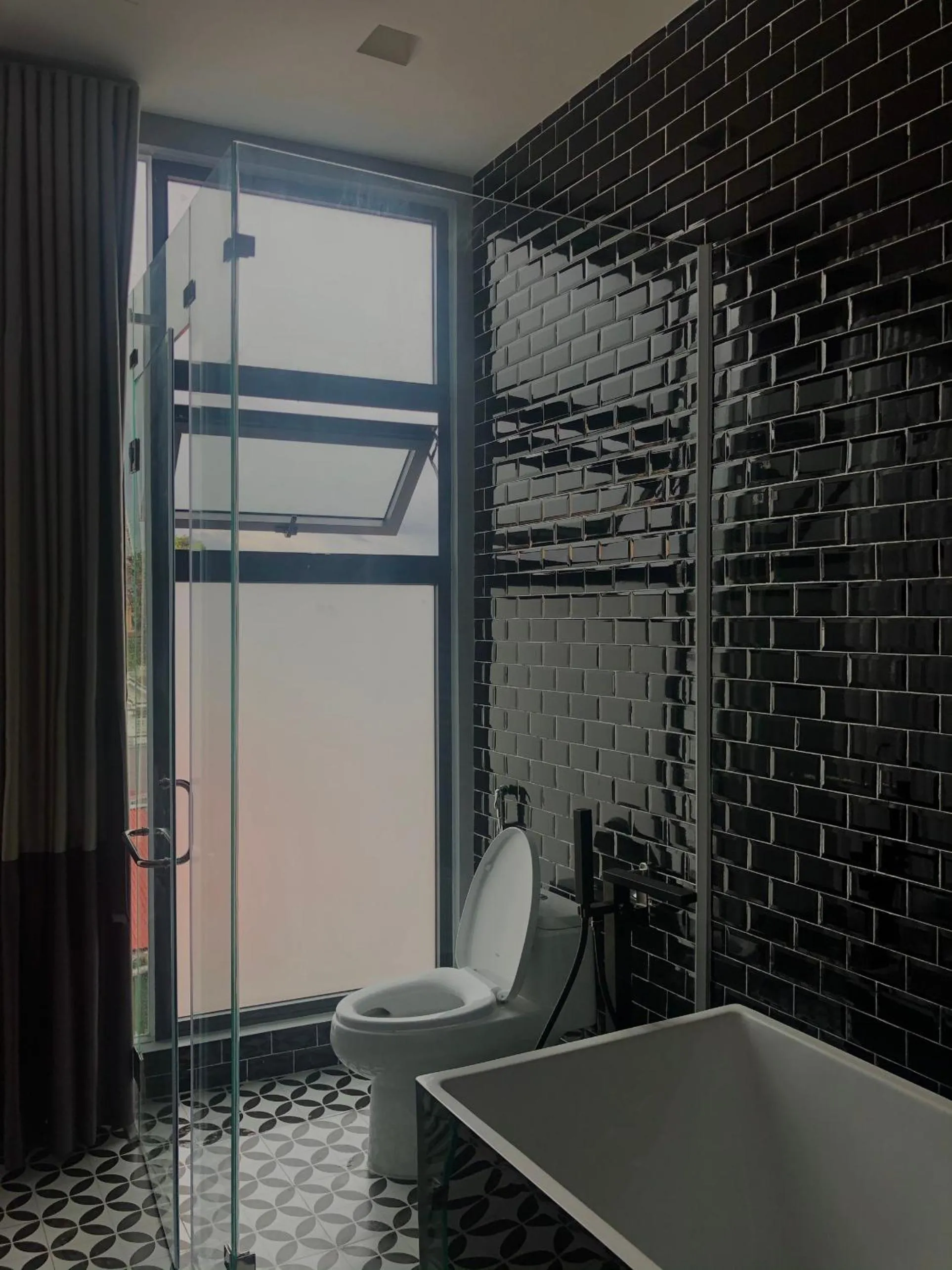 Bathroom in TTR Skypool View Hotel