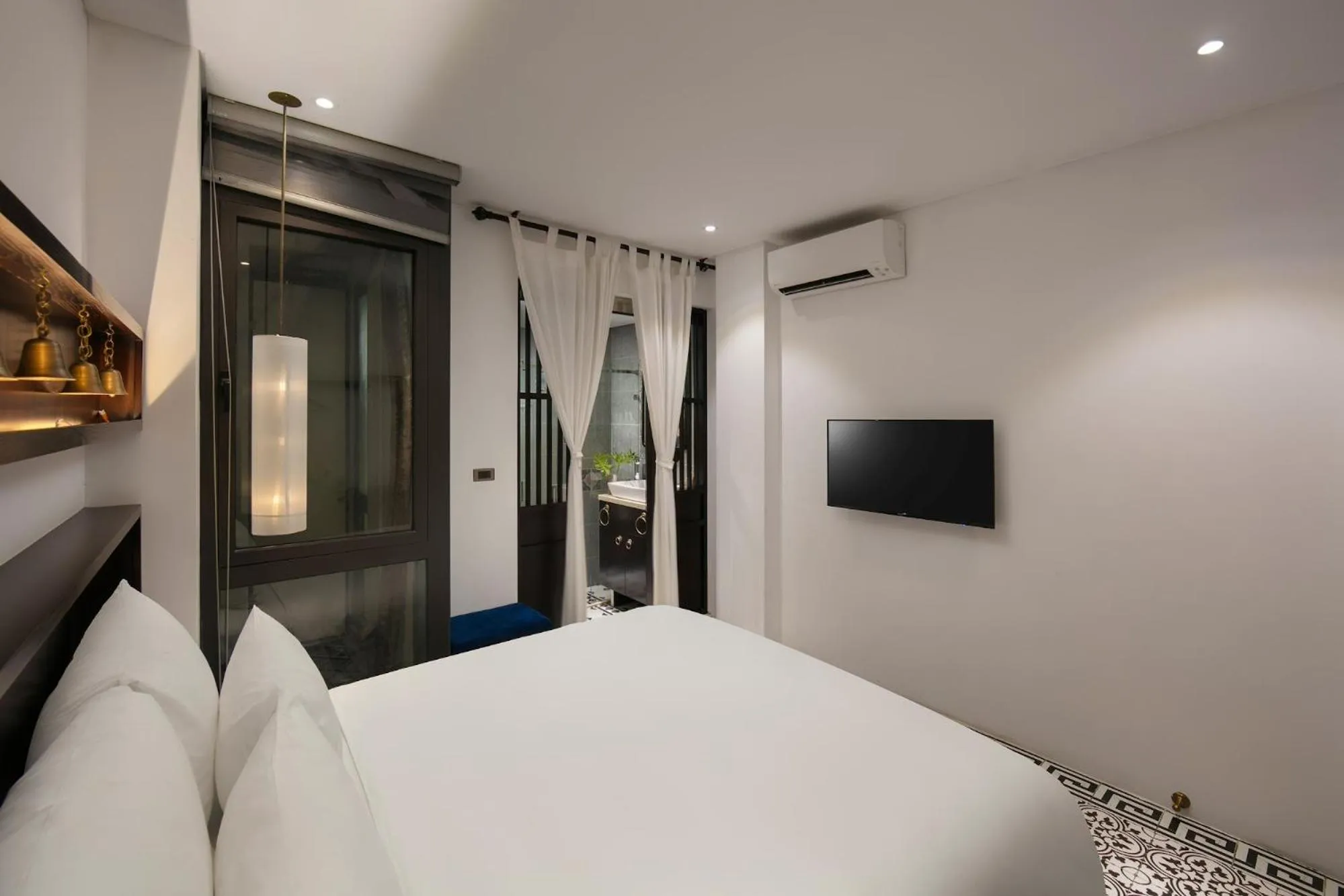 Bed in Carillon Boutique Hotel