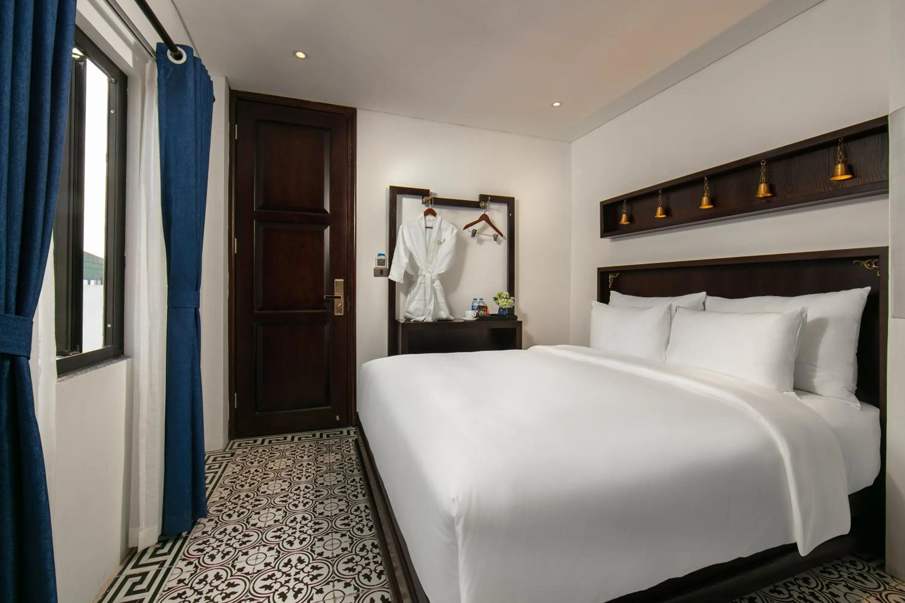 Bed in Carillon Boutique Hotel