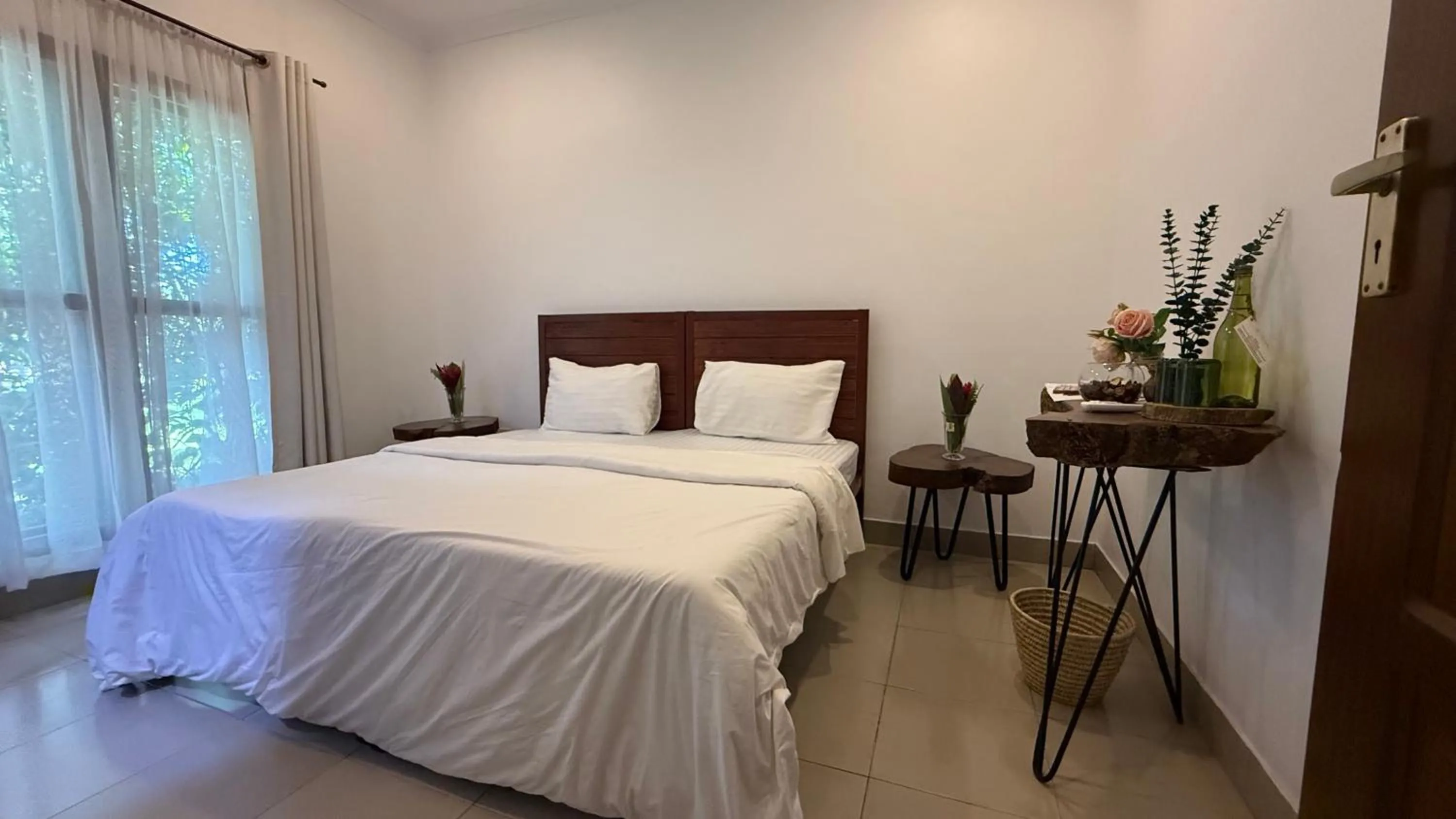 Bed in Tulivu Kilimanjaro Retreat