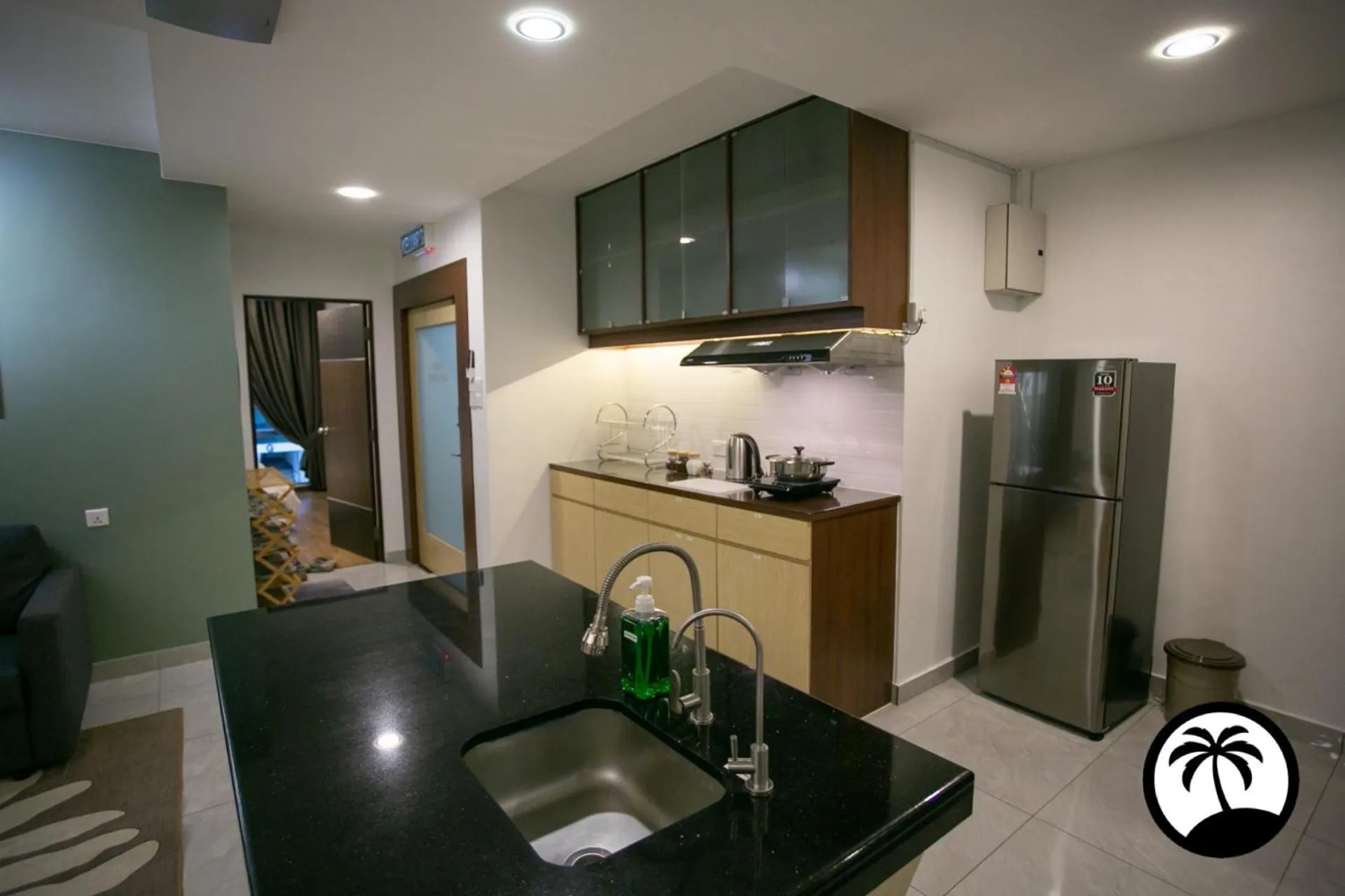 Kitchen or kitchenette in Paradise Suite at KK Times Square, beside Imago