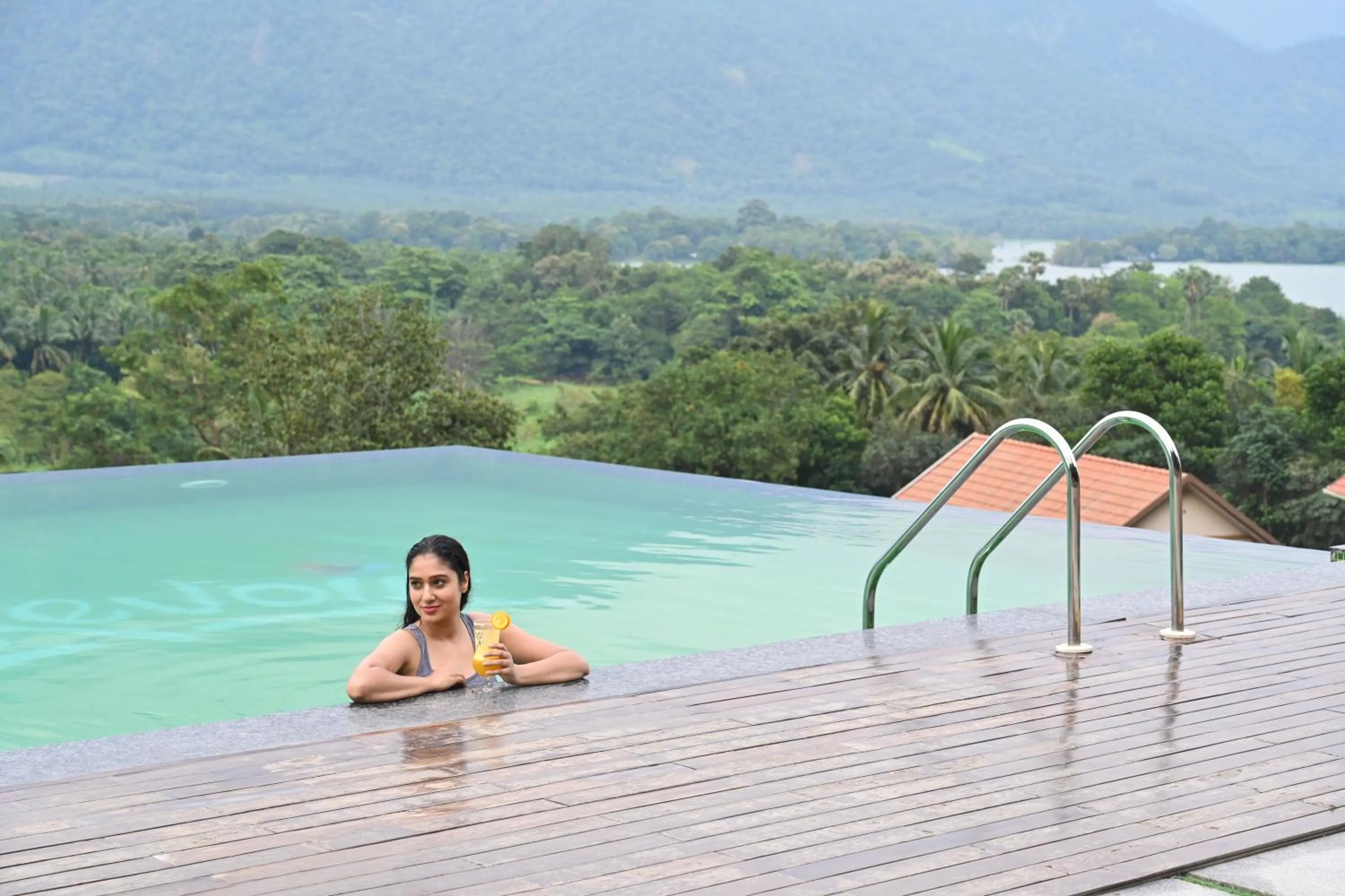 Swimming pool in Au Revoir Wellness Resort, Malampuzha