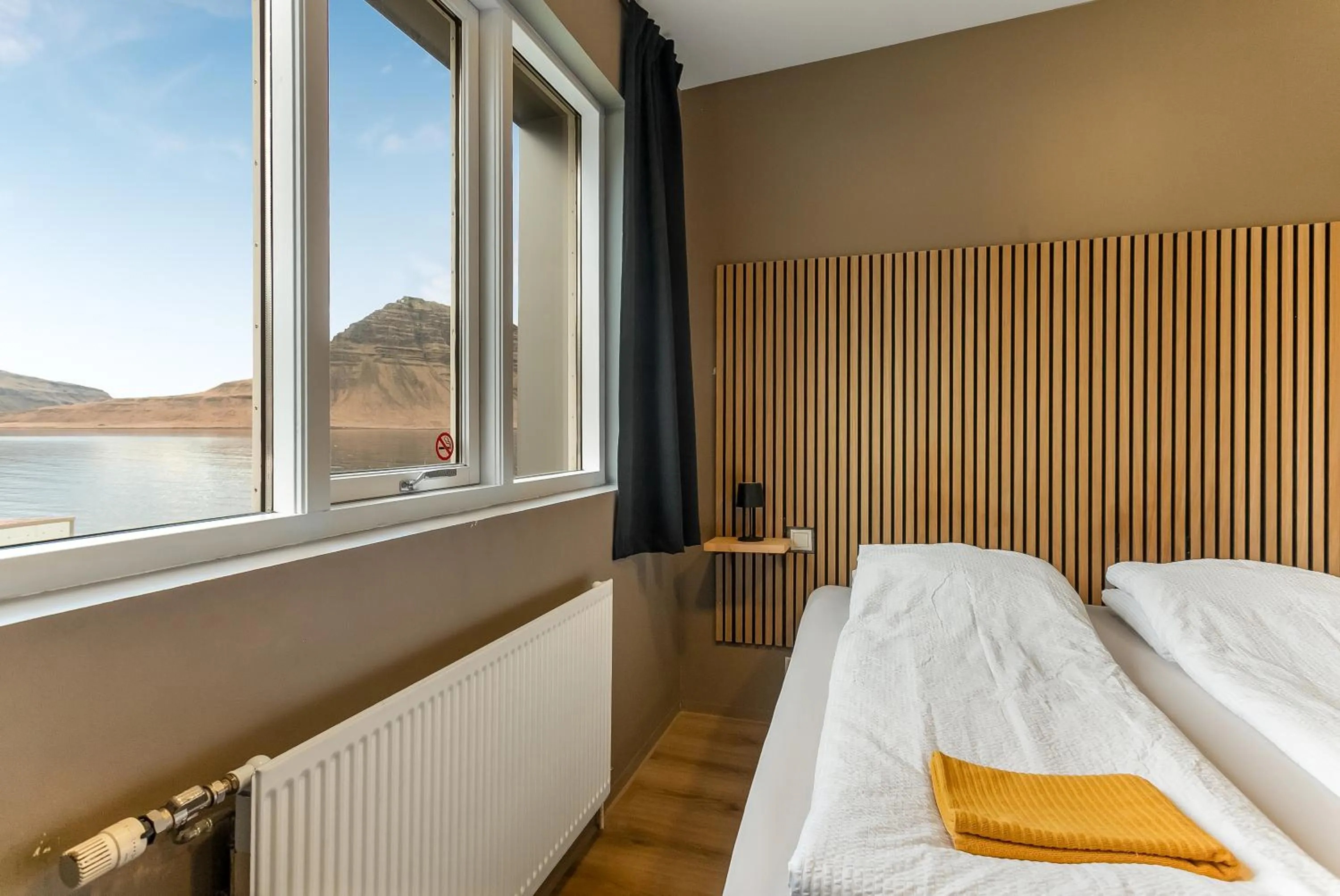 Bed in Stöð Guesthouse and apartments