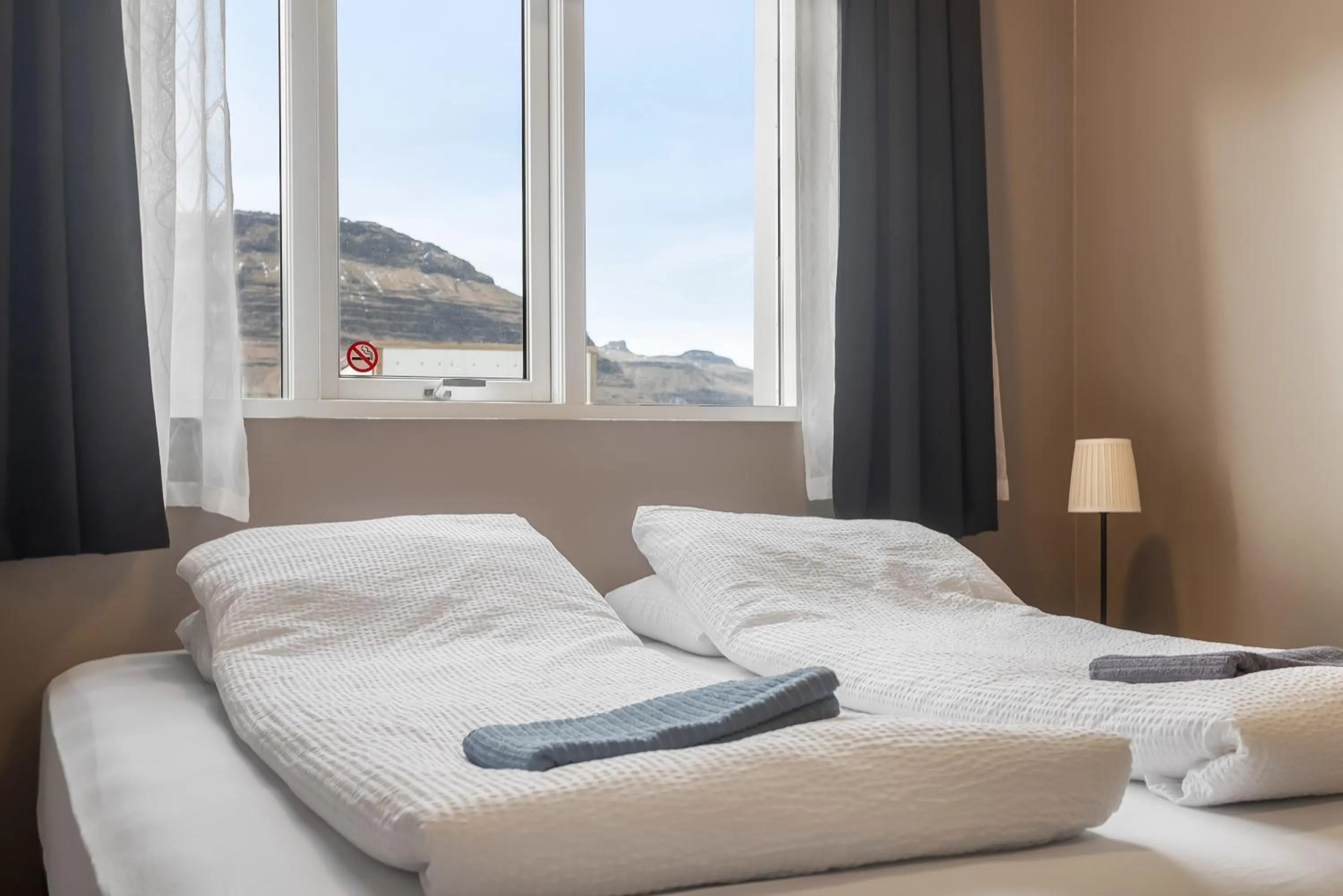 Bed in Stöð Guesthouse and apartments