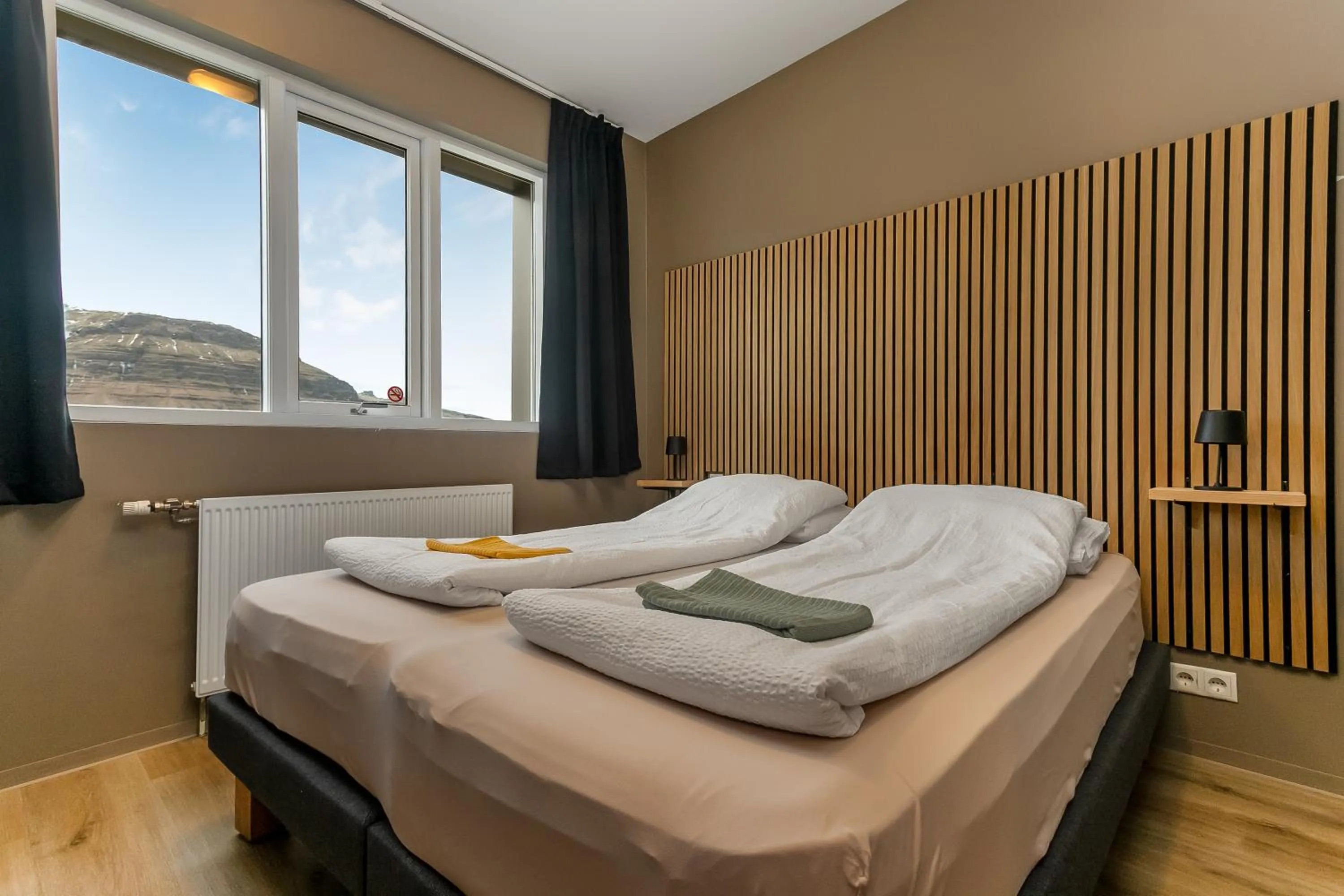 Bed in Stöð Guesthouse and apartments