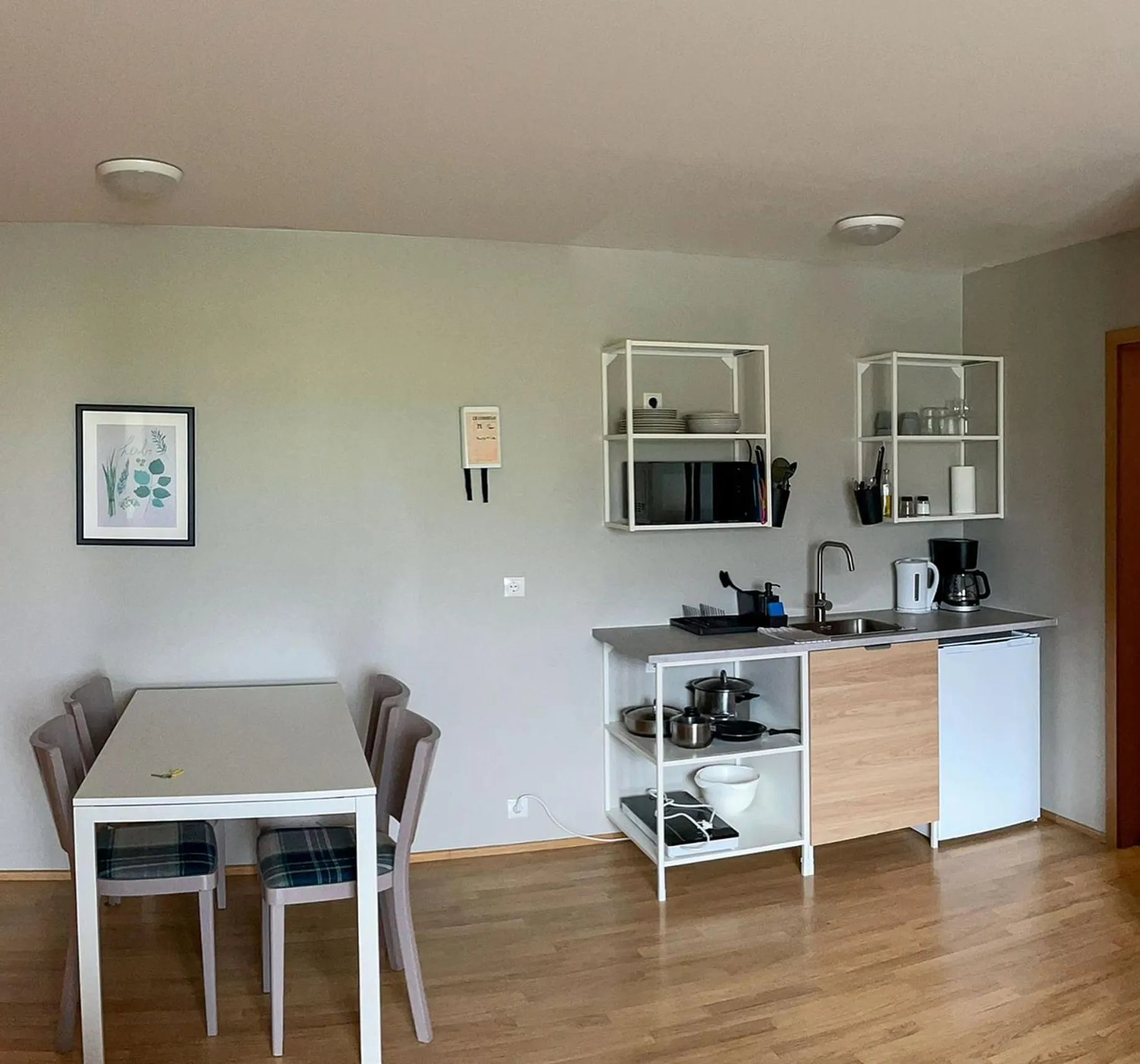 Kitchen or kitchenette in Stöð Guesthouse and apartments