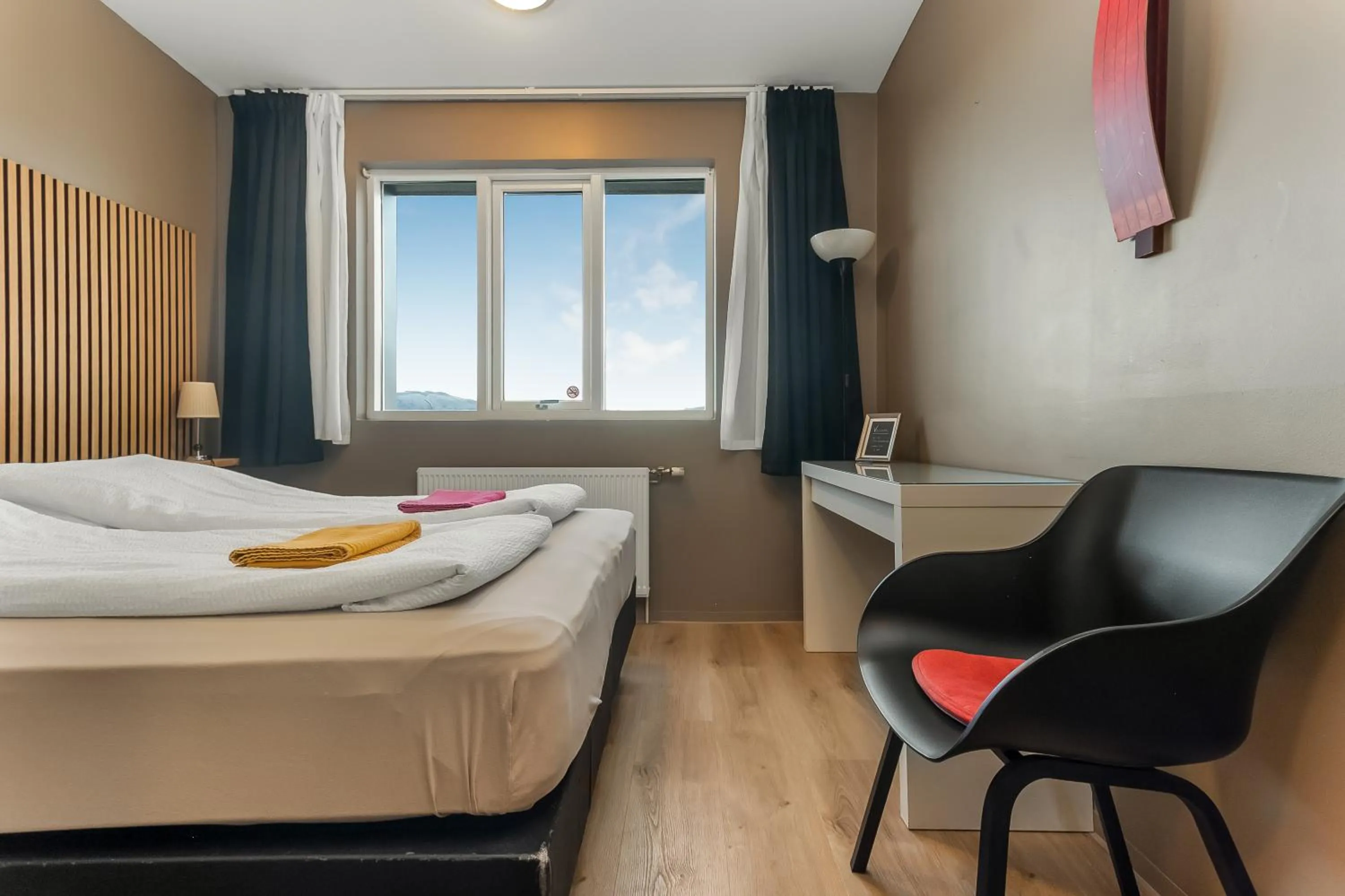 Bed in Stöð Guesthouse and apartments