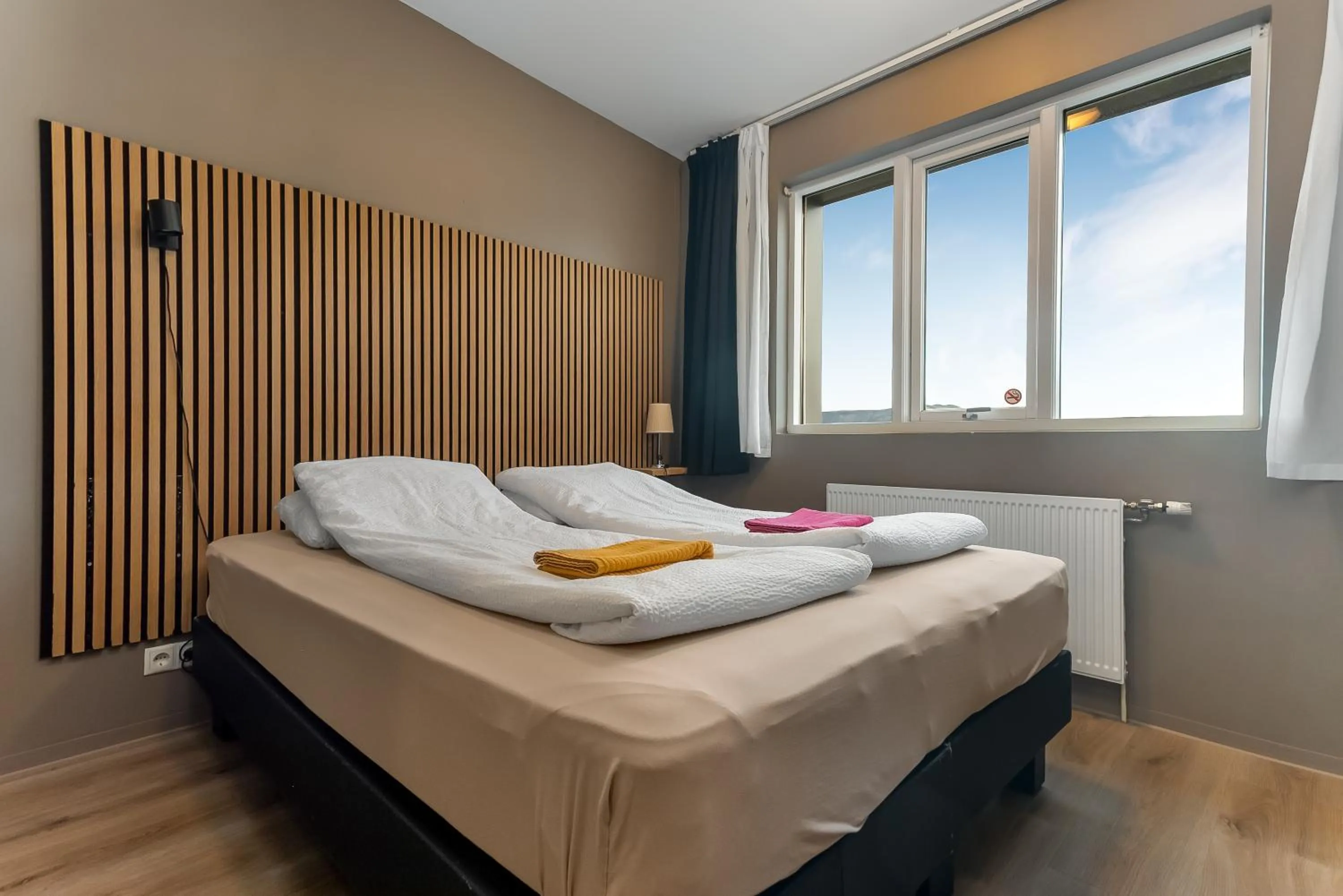 Bed in Stöð Guesthouse and apartments